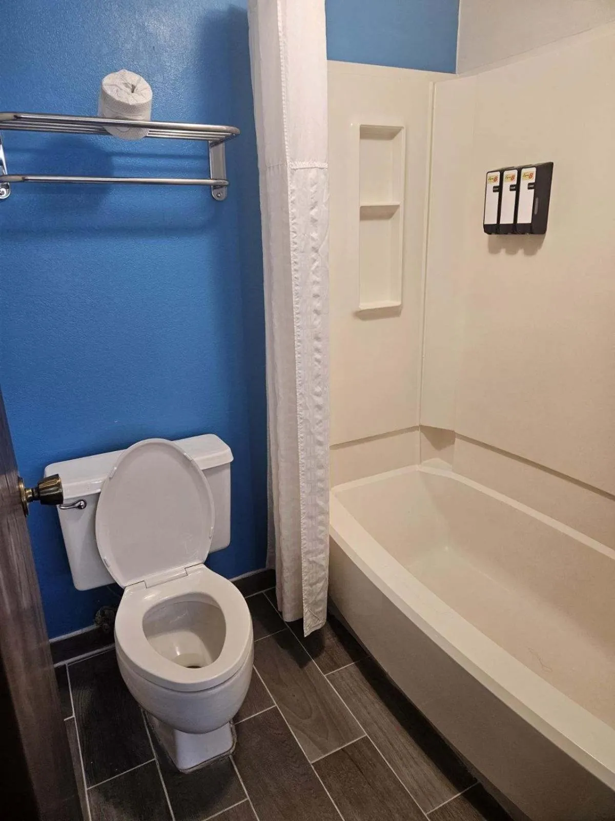 Toilet in Super 8 by Wyndham Lincoln West