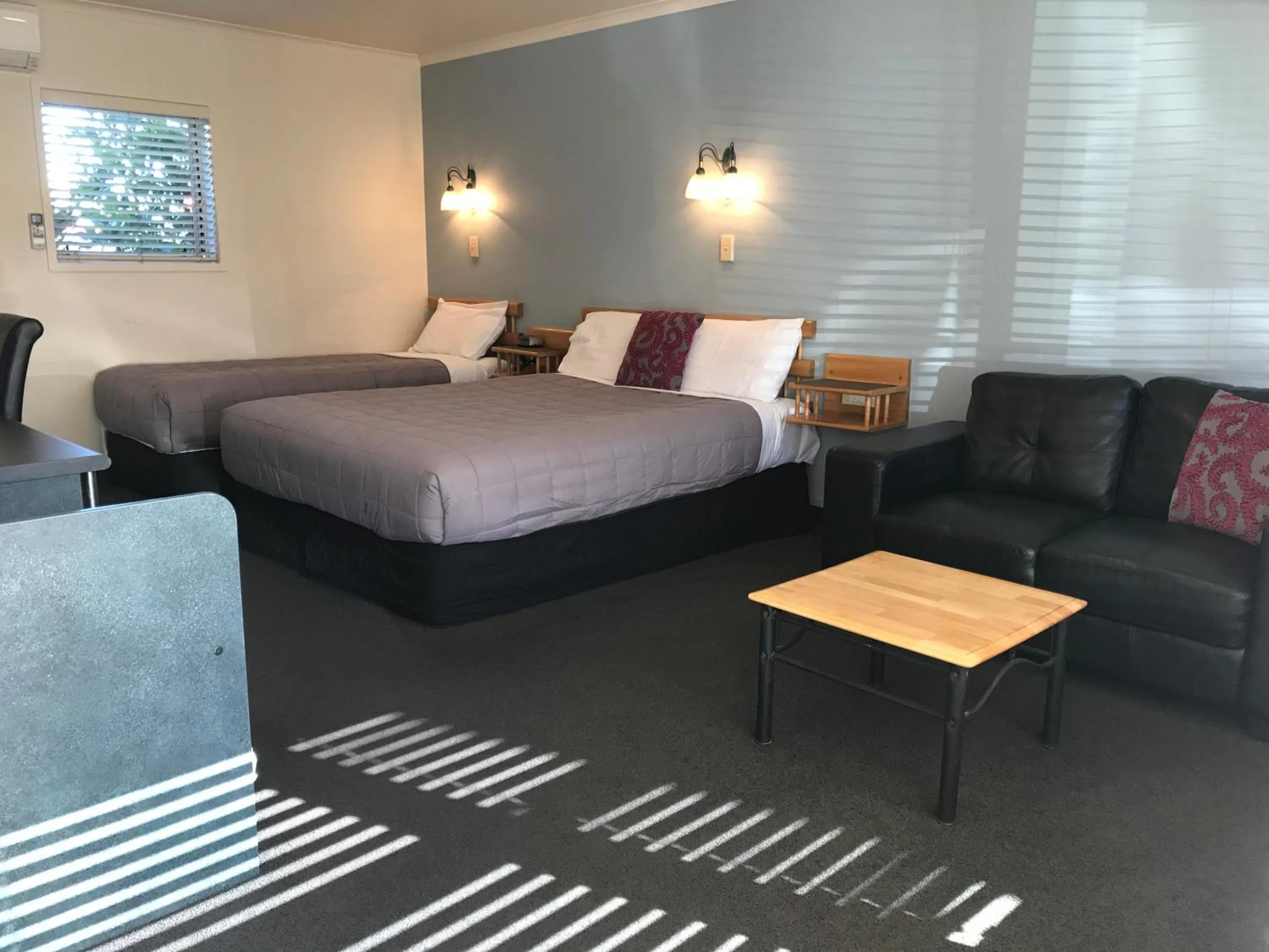 Bed in Pacific Harbour Motor Inn