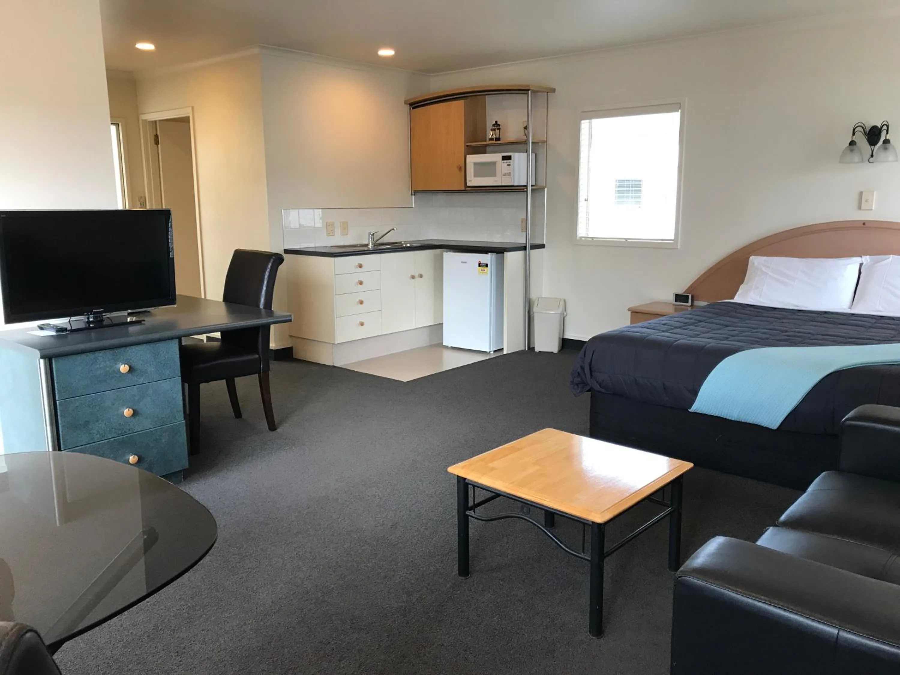 Bed in Pacific Harbour Motor Inn