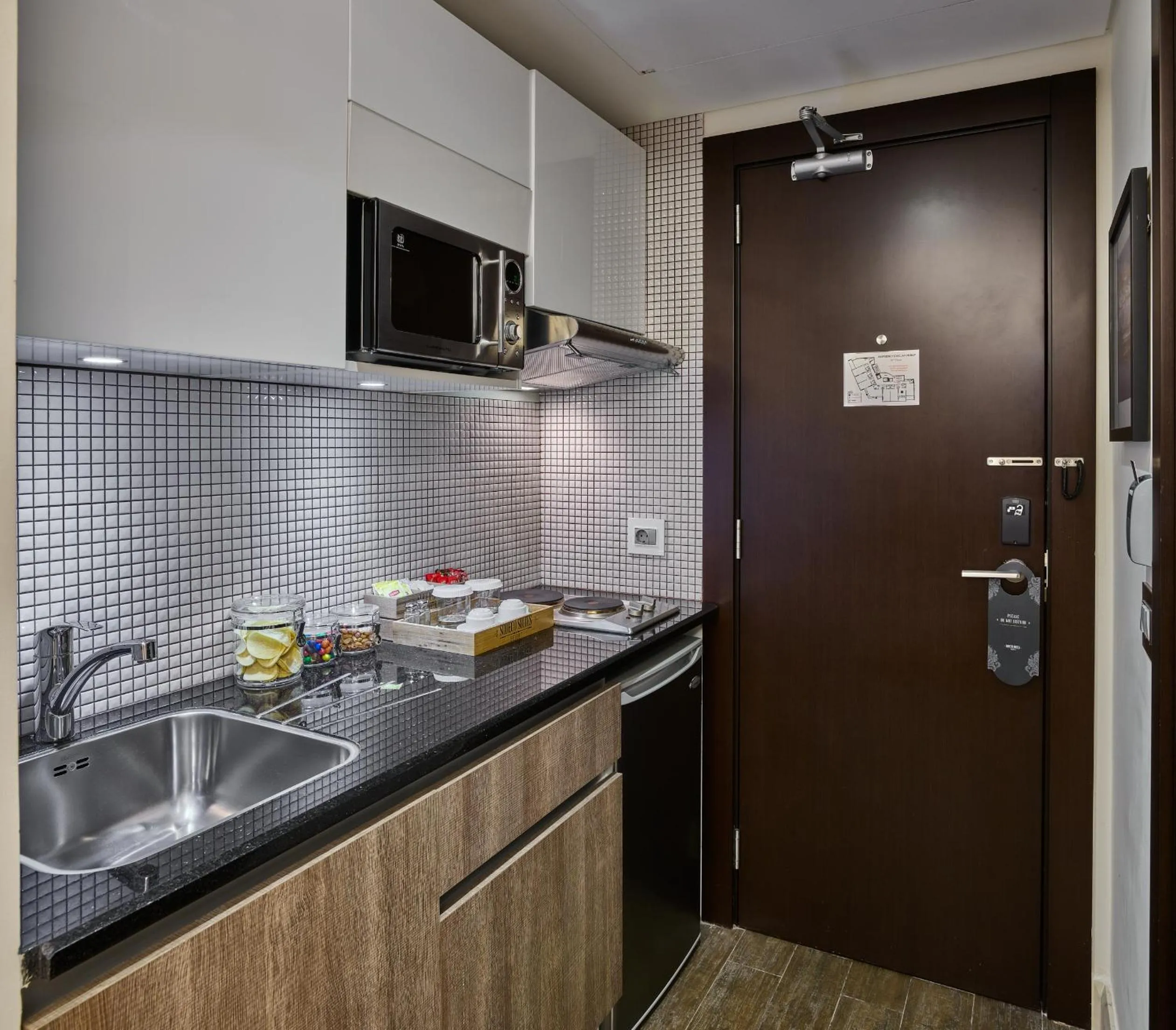 Kitchen or kitchenette in Sodeco Suites