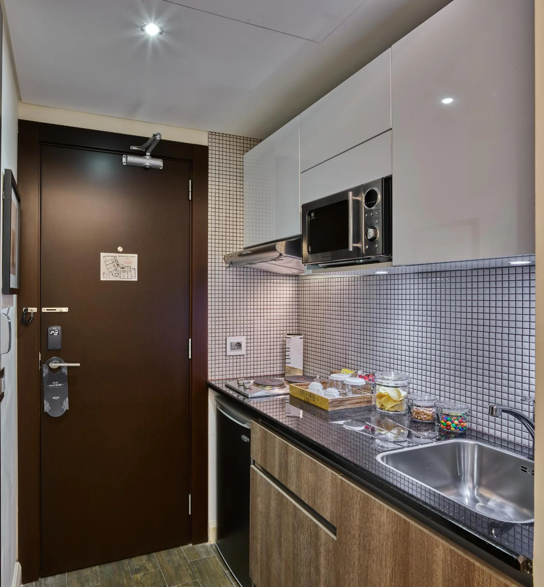 Kitchen or kitchenette in Sodeco Suites