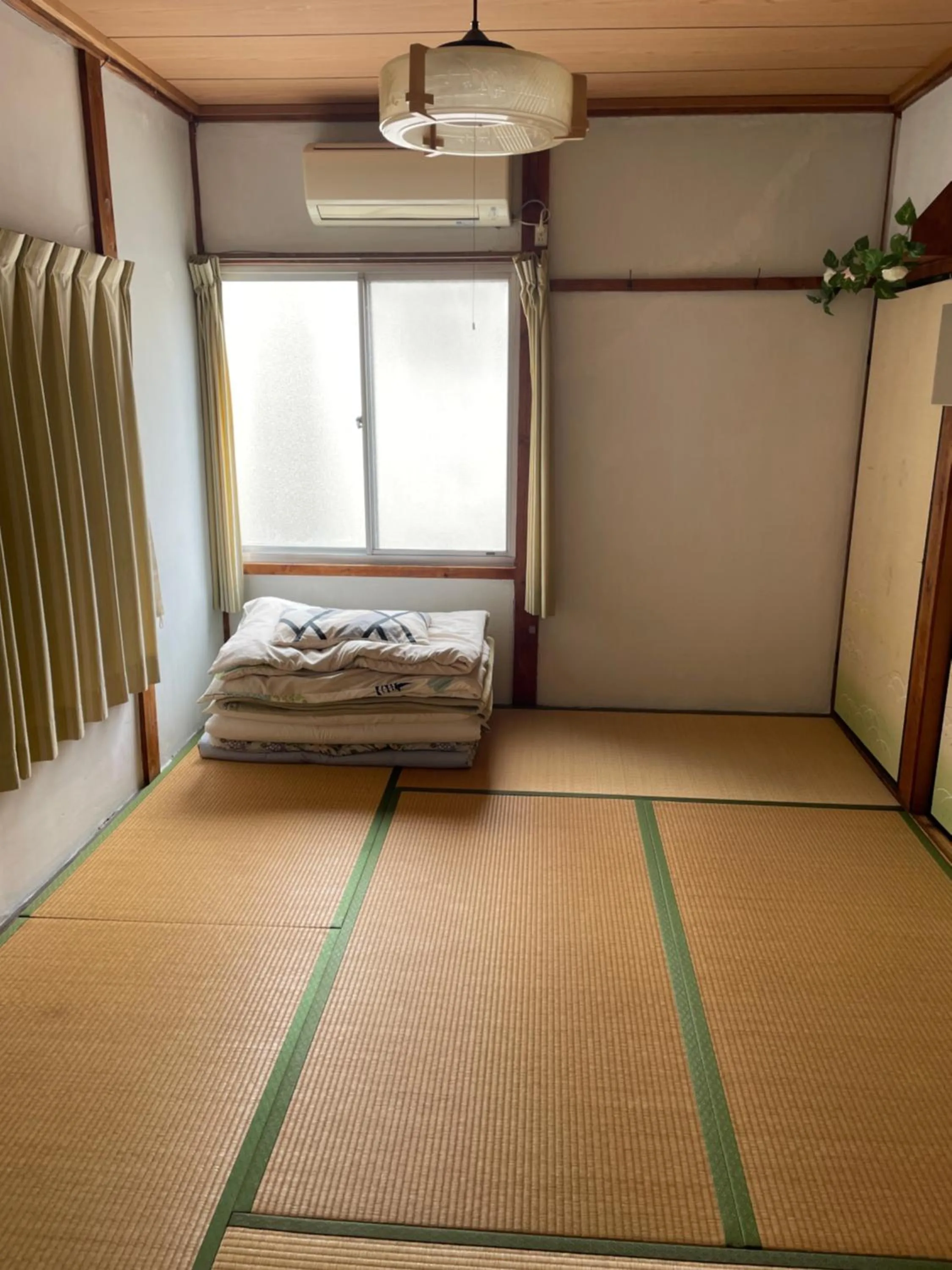 Bed in Tentsuku Guest House