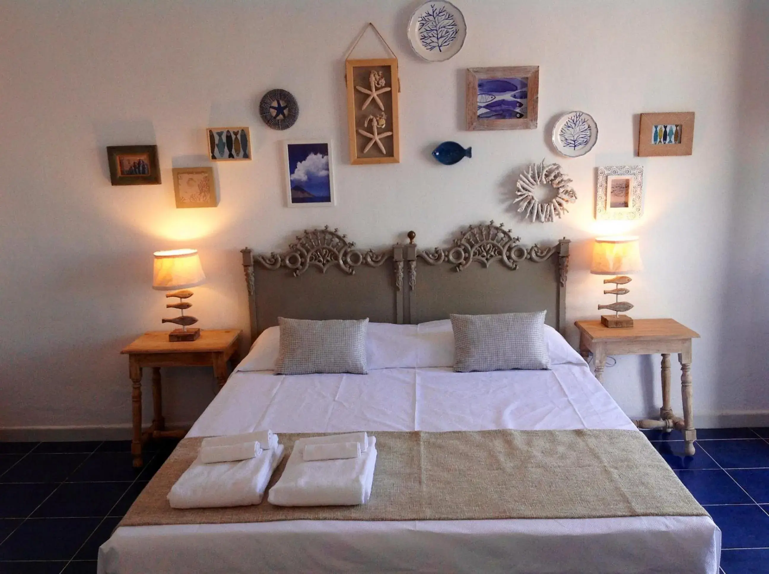 Bed in La Sciara Resort Hotel Bed in La Sciara Resort Hotel