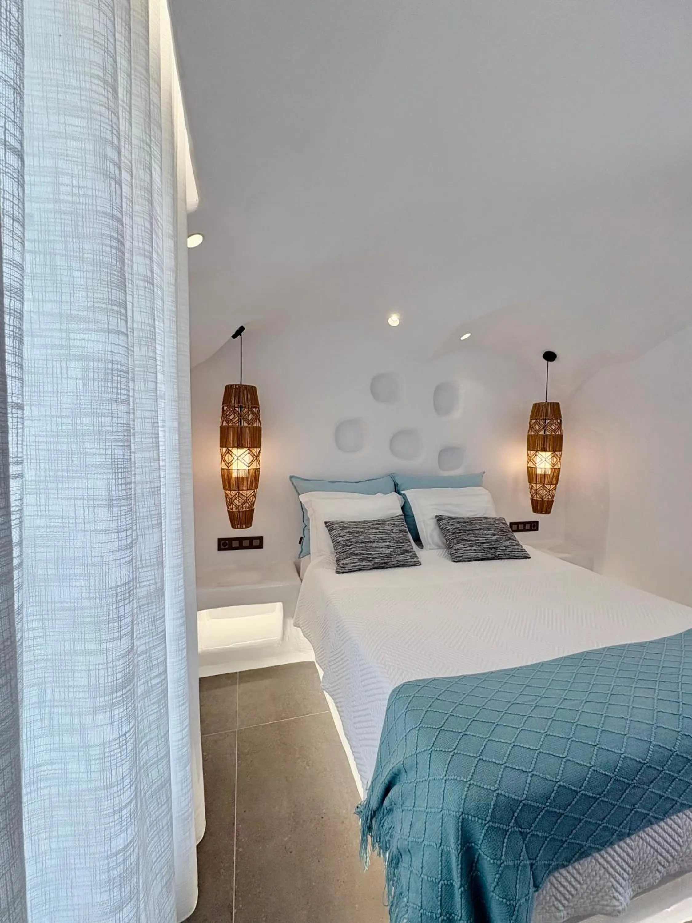 Photo of the whole room, Bed in Naxos Cave Suites