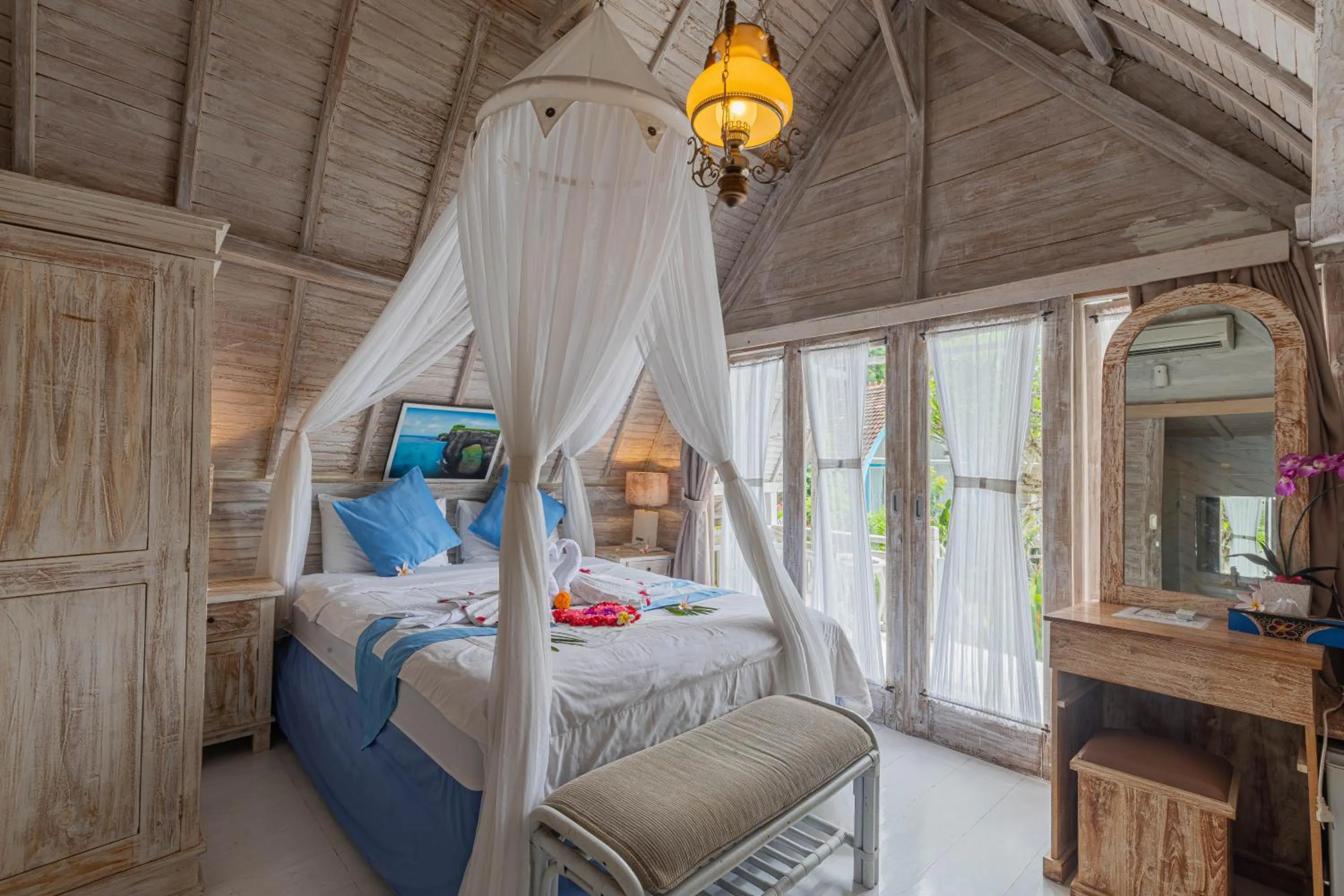 Bed in Bakung Cozy Cottage