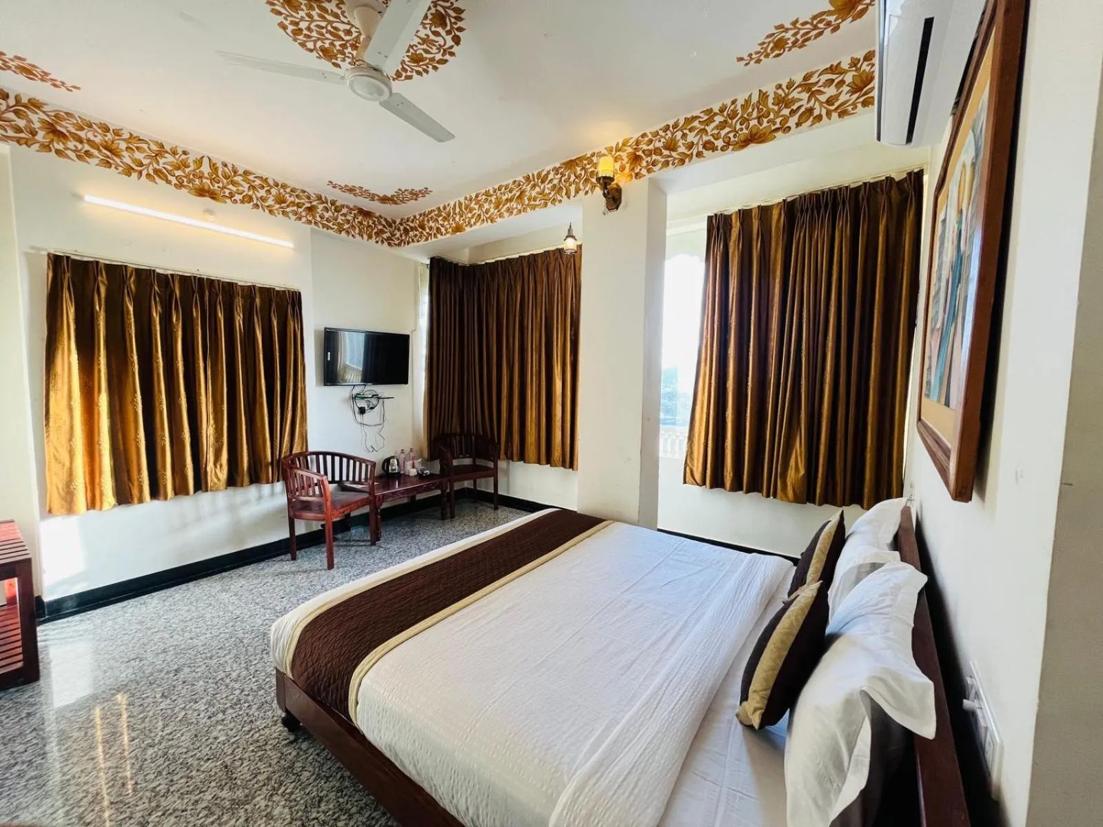 Seating area, Bed in Teerth Palace Pushkar