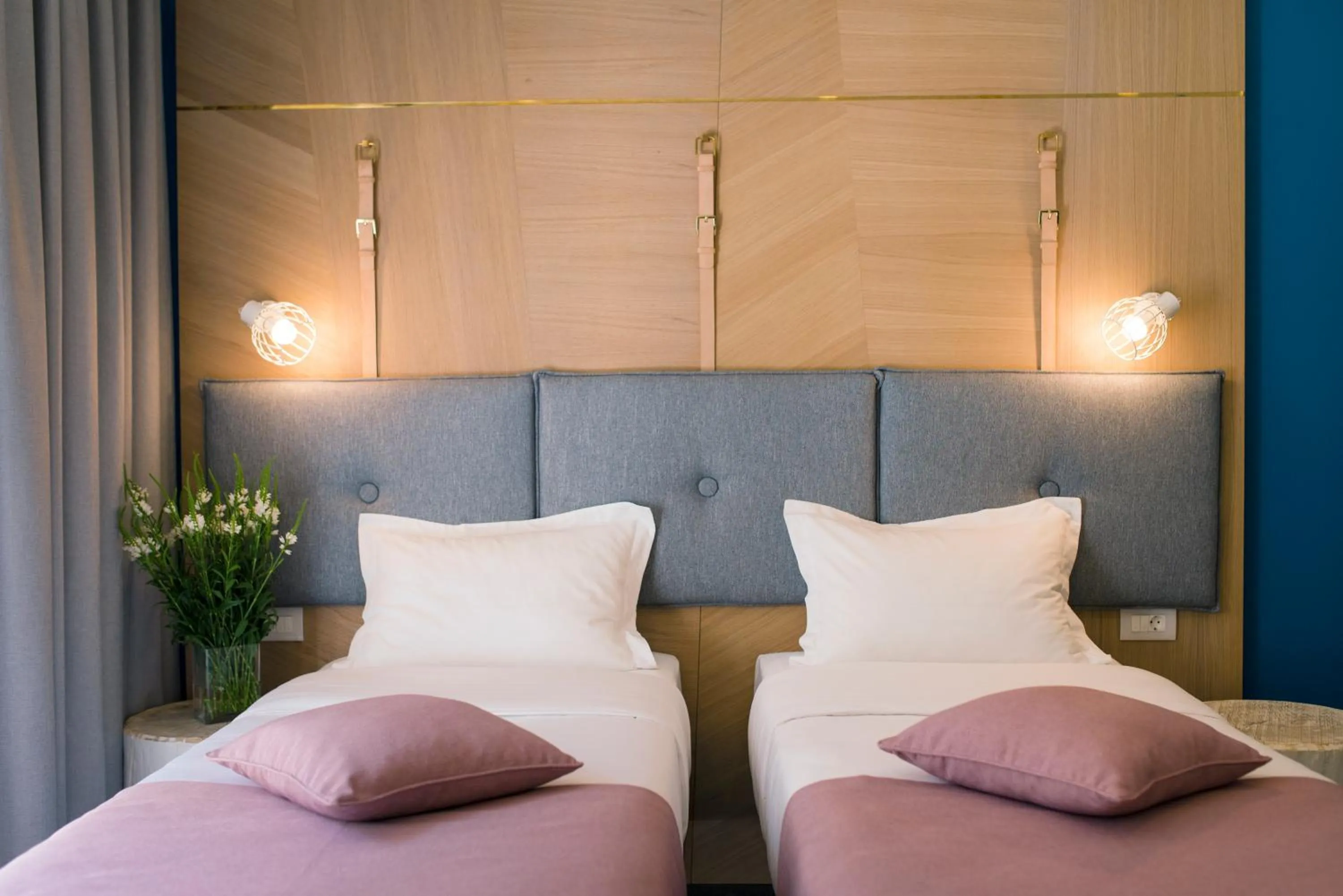 Bed in City Nest Modern & Cozy Suites