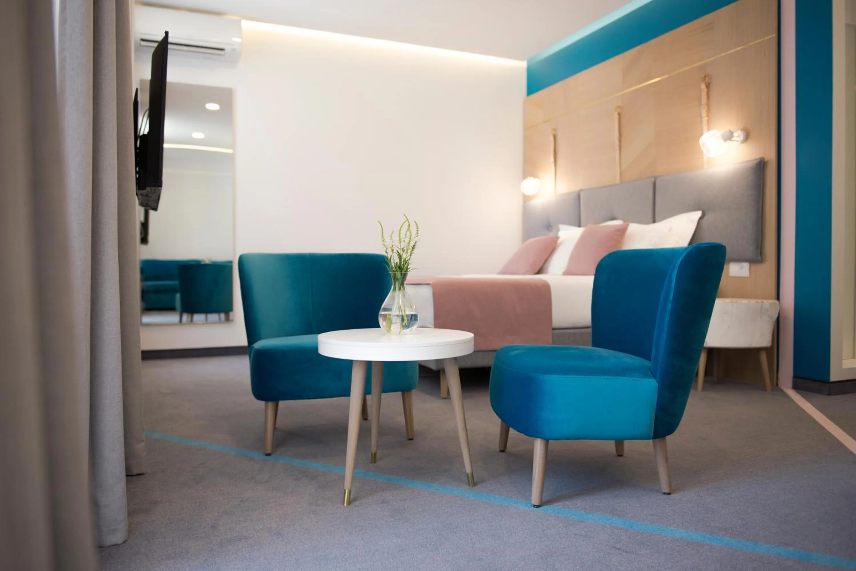 Bed in City Nest Modern & Cozy Suites