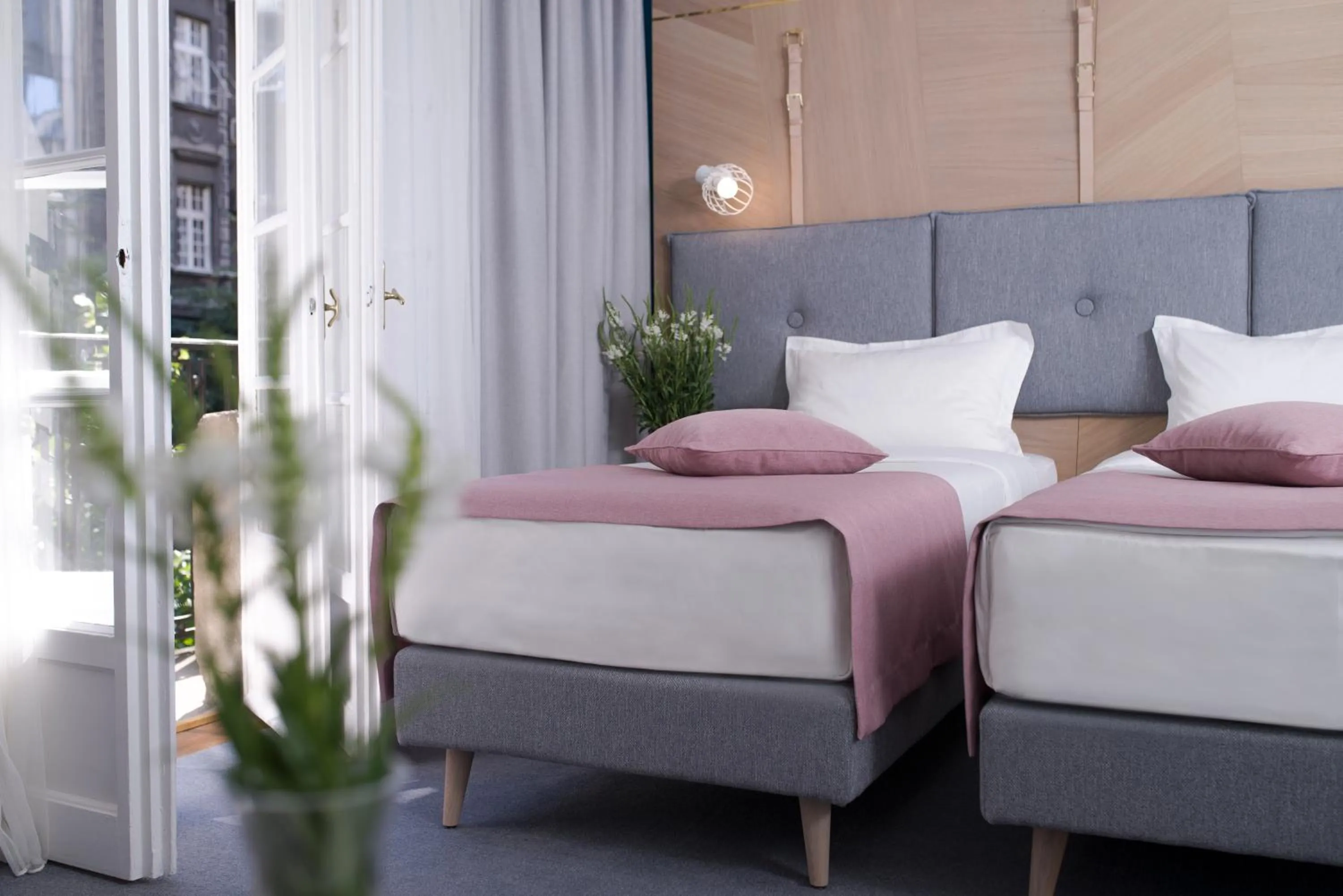 Bed in City Nest Modern & Cozy Suites