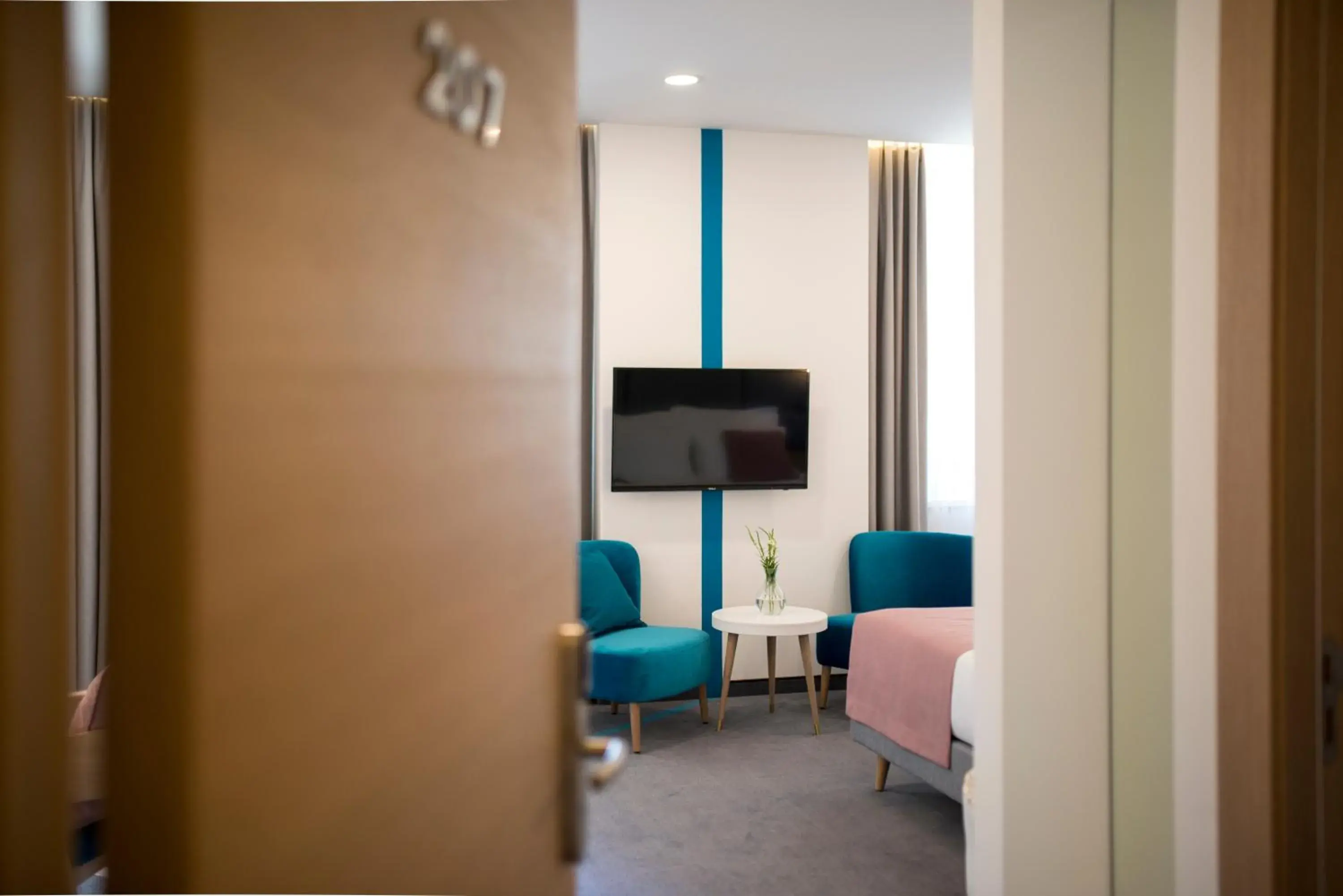 Bed in City Nest Modern & Cozy Suites Bed in City Nest Modern & Cozy Suites