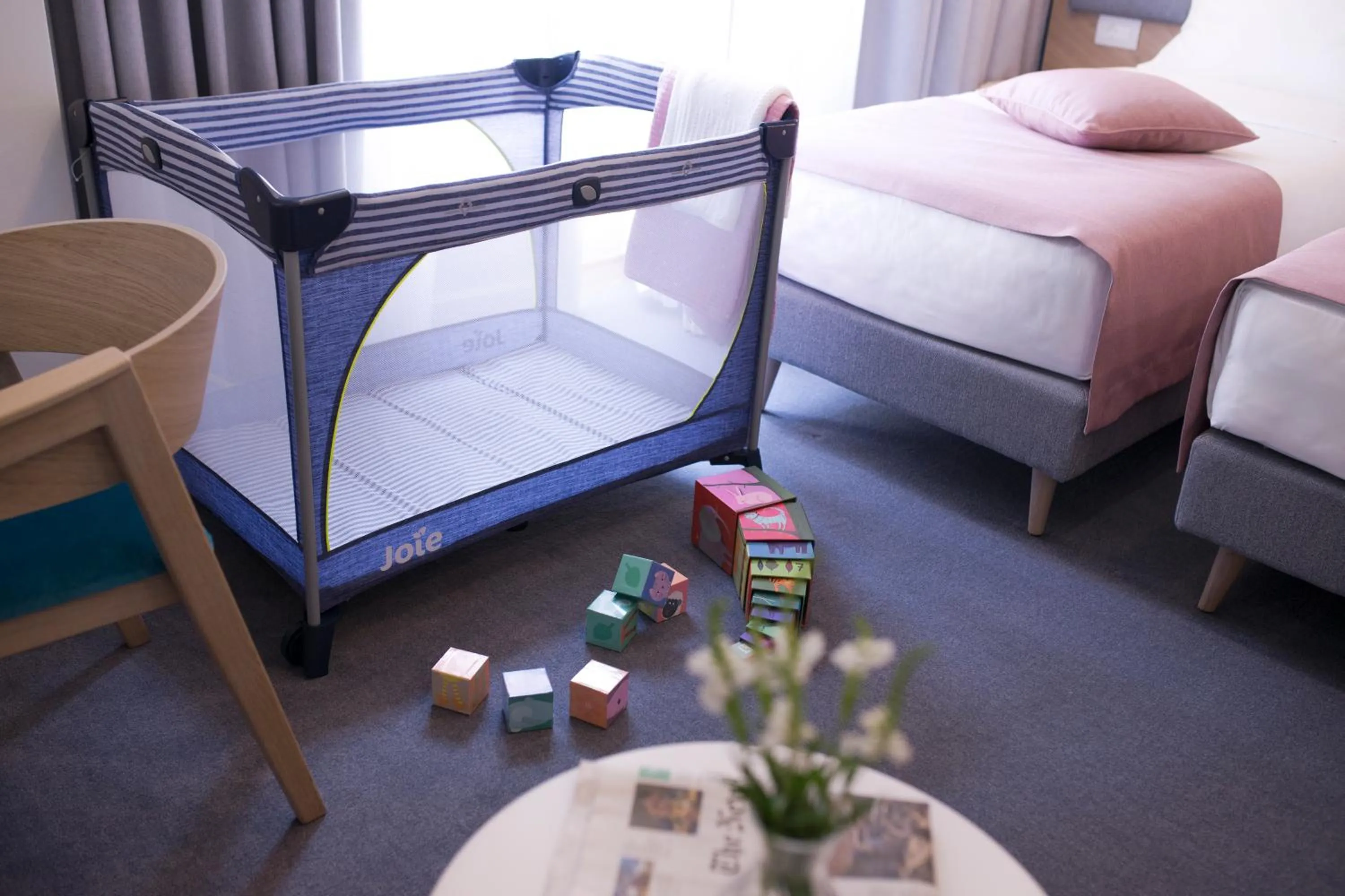 Bed in City Nest Modern & Cozy Suites