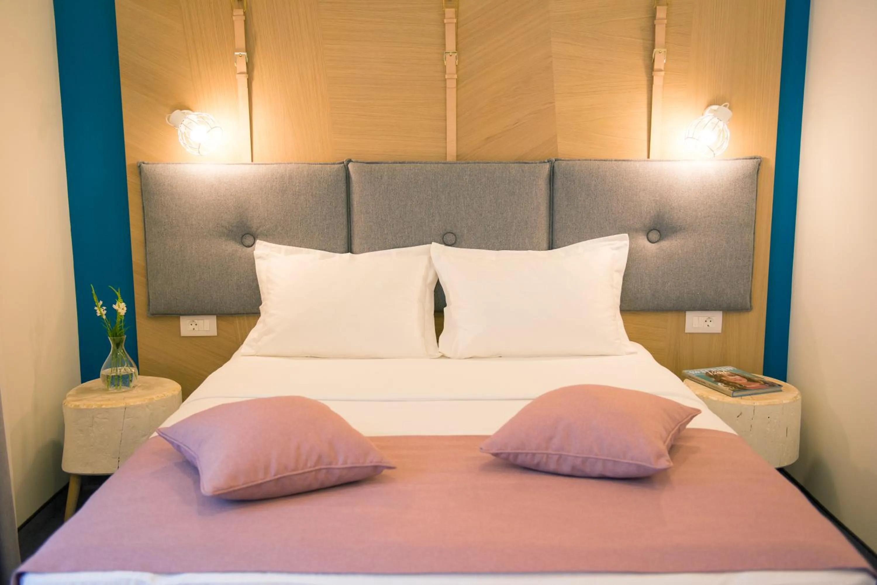 Bed in City Nest Modern & Cozy Suites