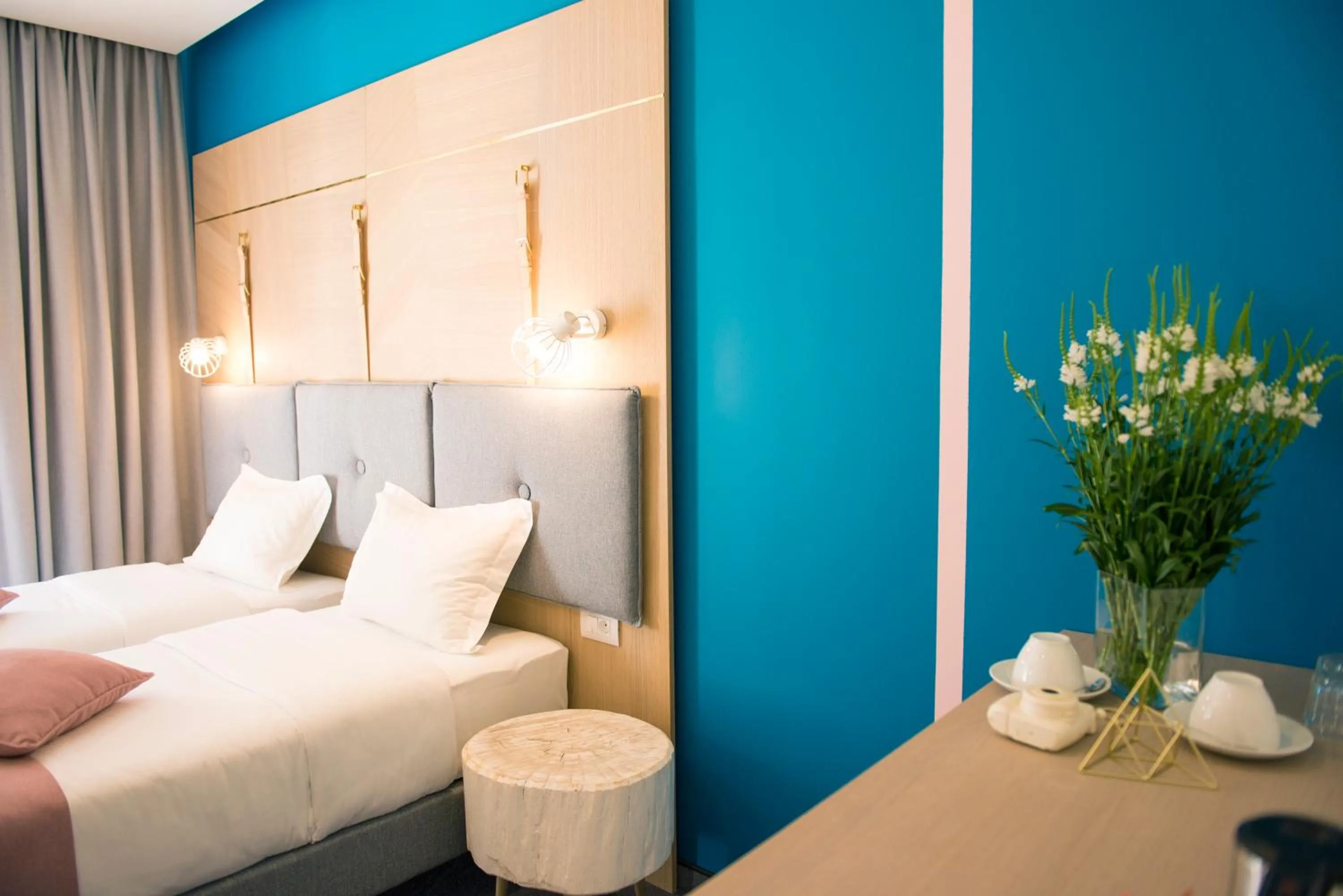 Bed in City Nest Modern & Cozy Suites