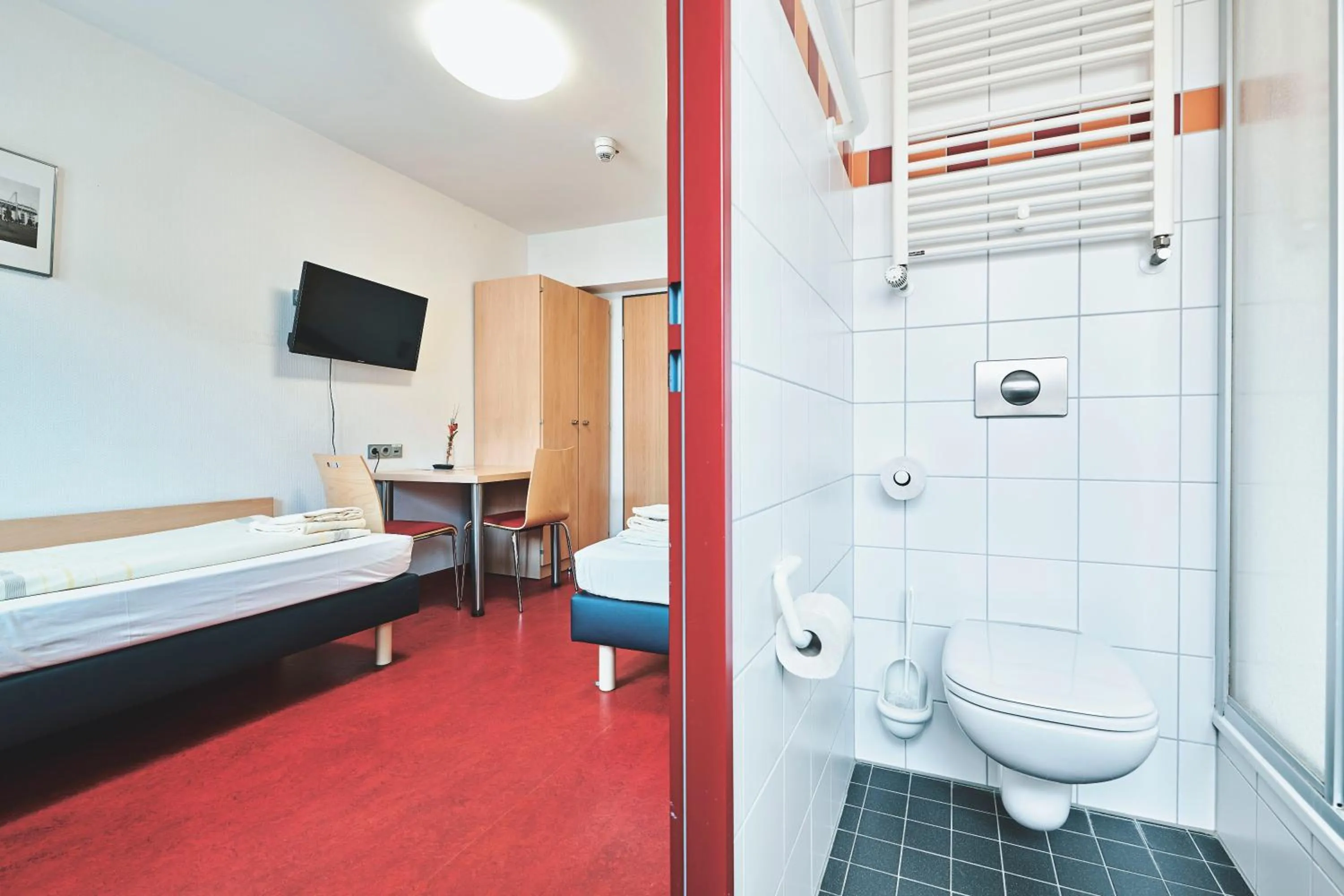 Photo of the whole room, Bed in DJH Jugendgästehaus Adolph Kolping