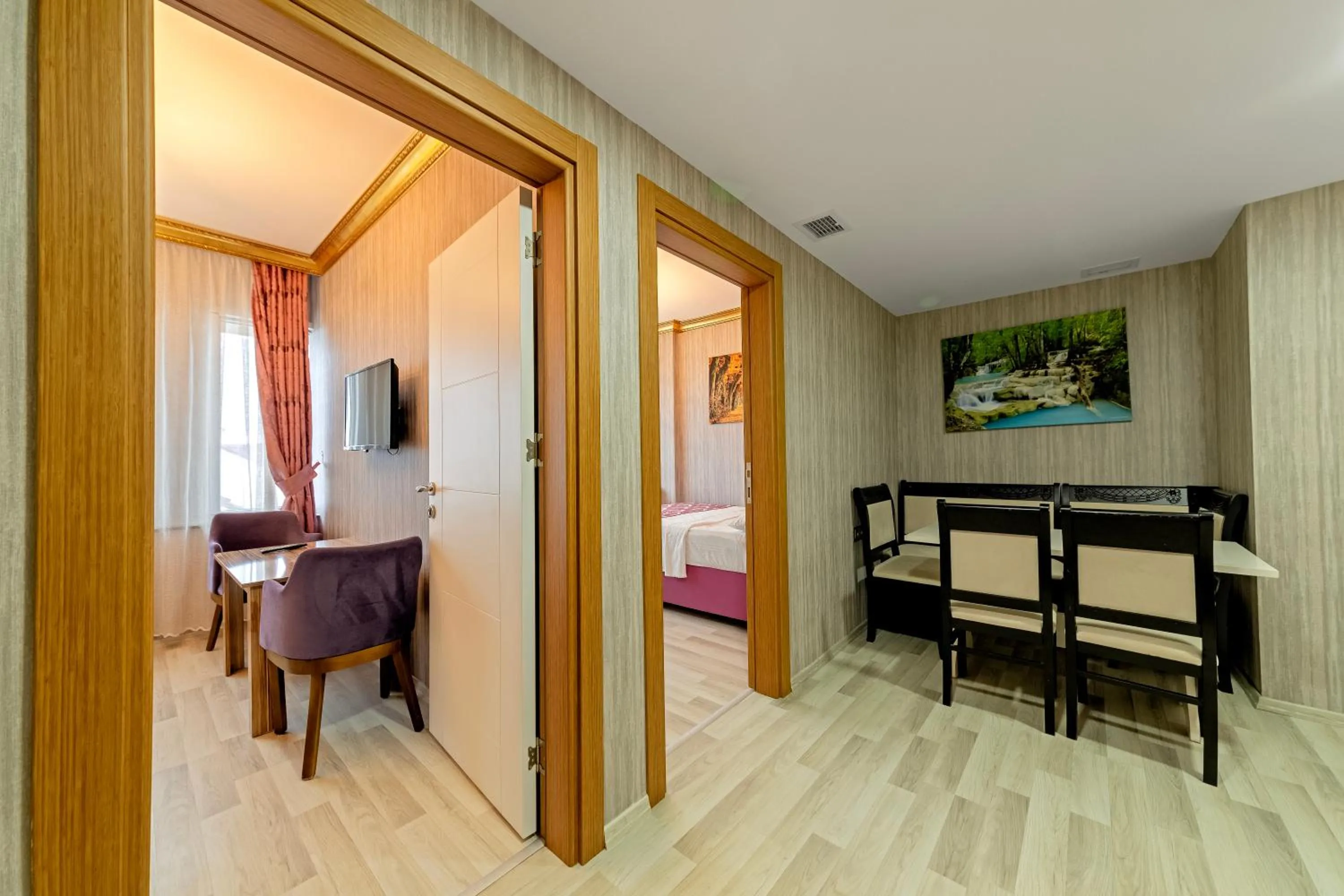 Bed in Royal Babil Suites Hotel