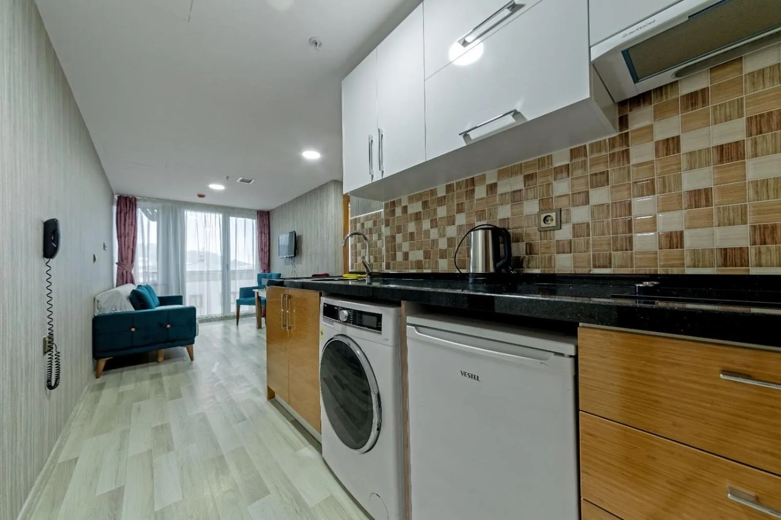 Kitchen or kitchenette in Royal Babil Suites Hotel