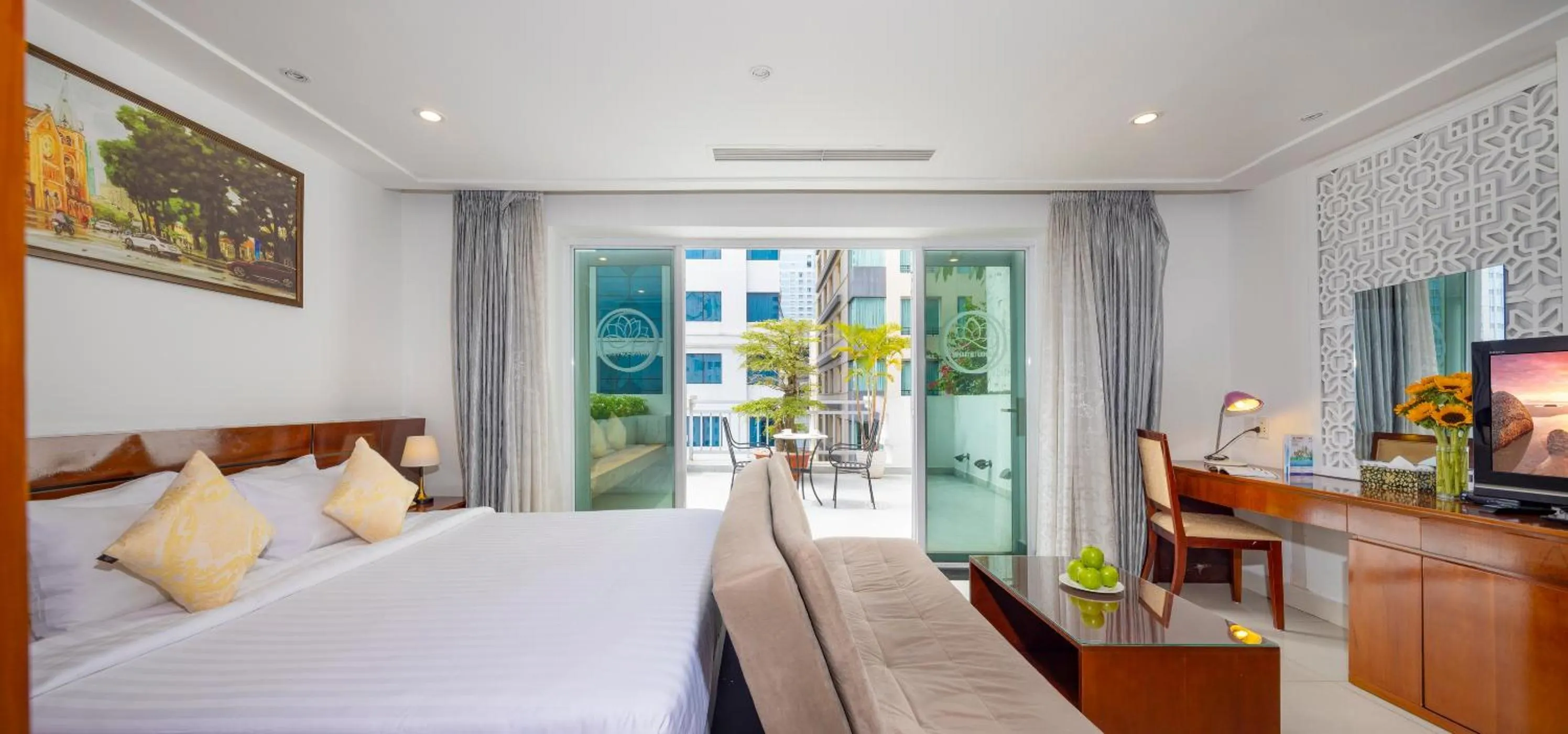 Photo of the whole room, Bed in White Lotus Hotel Saigon