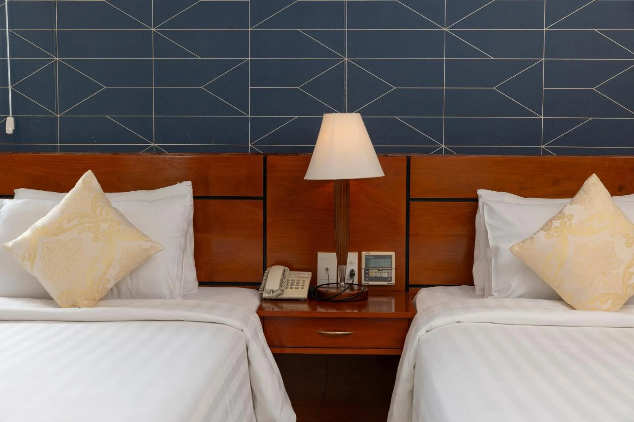 Bed in White Lotus Hotel Saigon