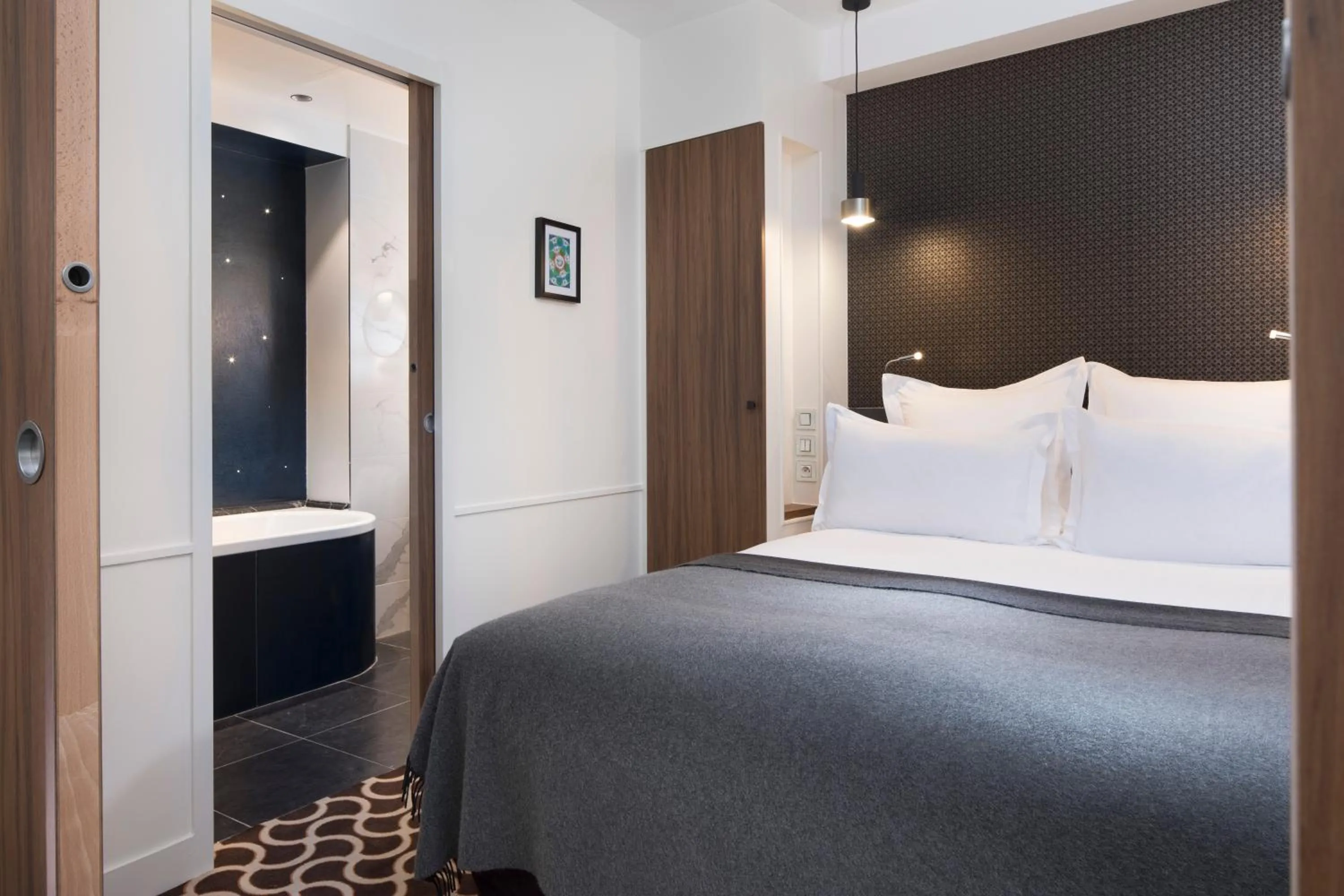 Bed in Hôtel Le Pradey