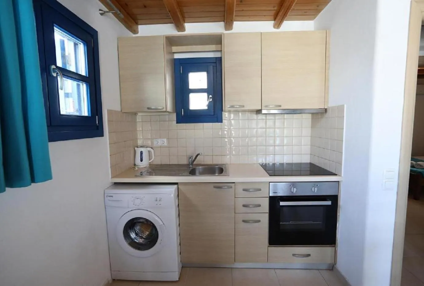 Kitchen or kitchenette in Mykonos Pro-care Suites