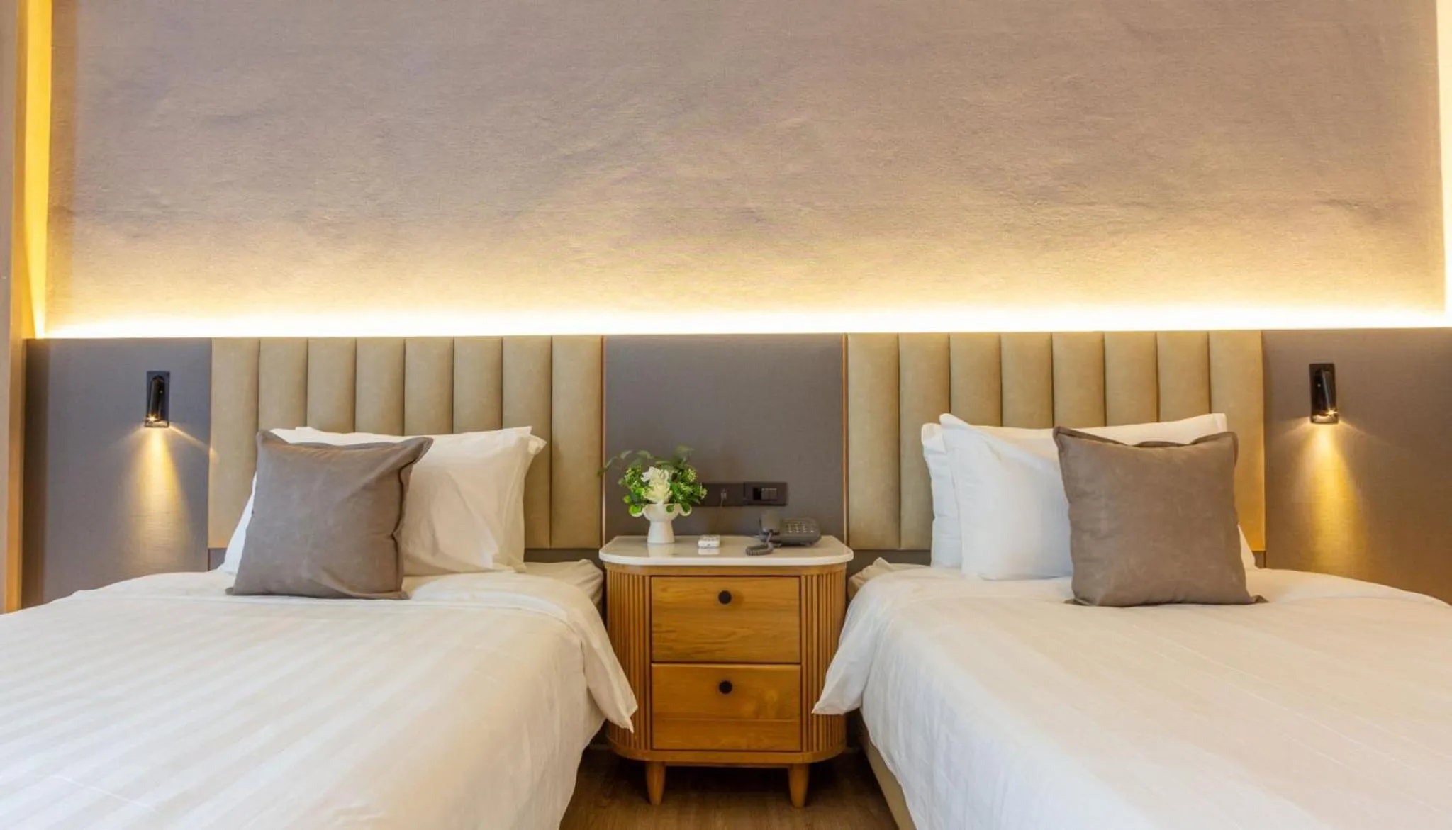 Bed in Gassan Khuntan Golf & Resort