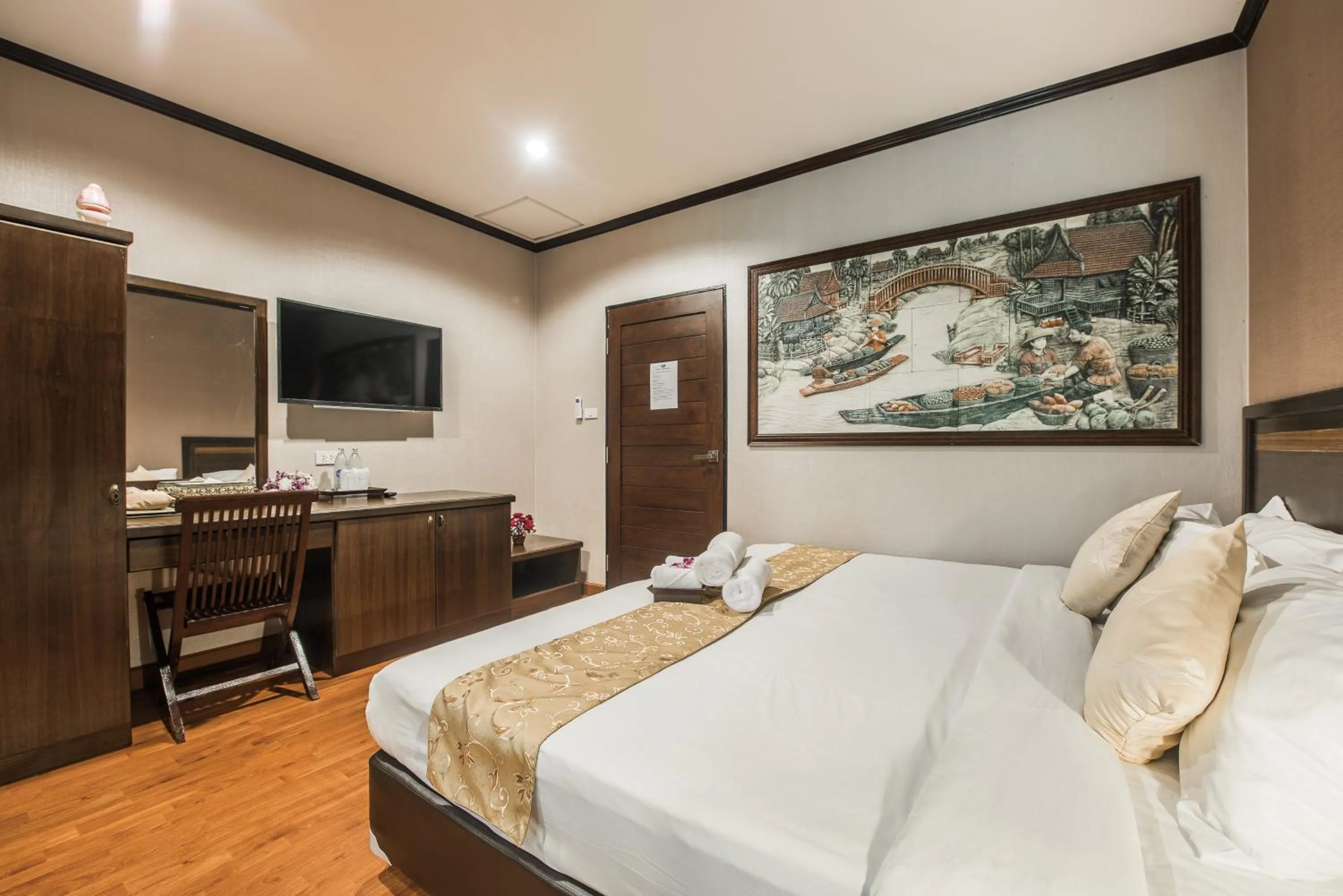 Bed in Gassan Khuntan Golf & Resort