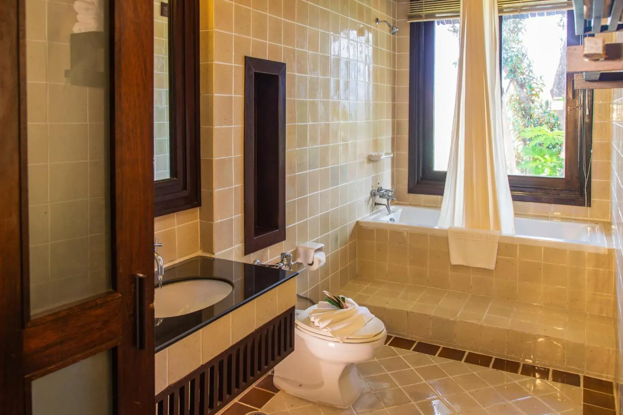 Bathroom in Gassan Khuntan Golf & Resort Bathroom in Gassan Khuntan Golf & Resort