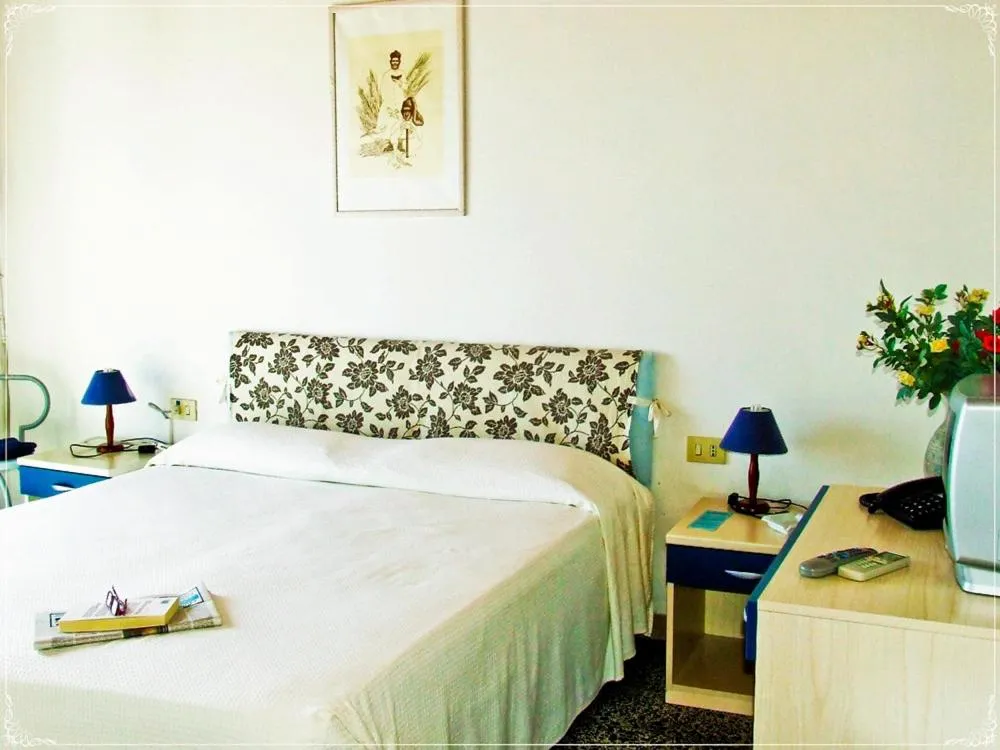 Bed in Hotel Miramare