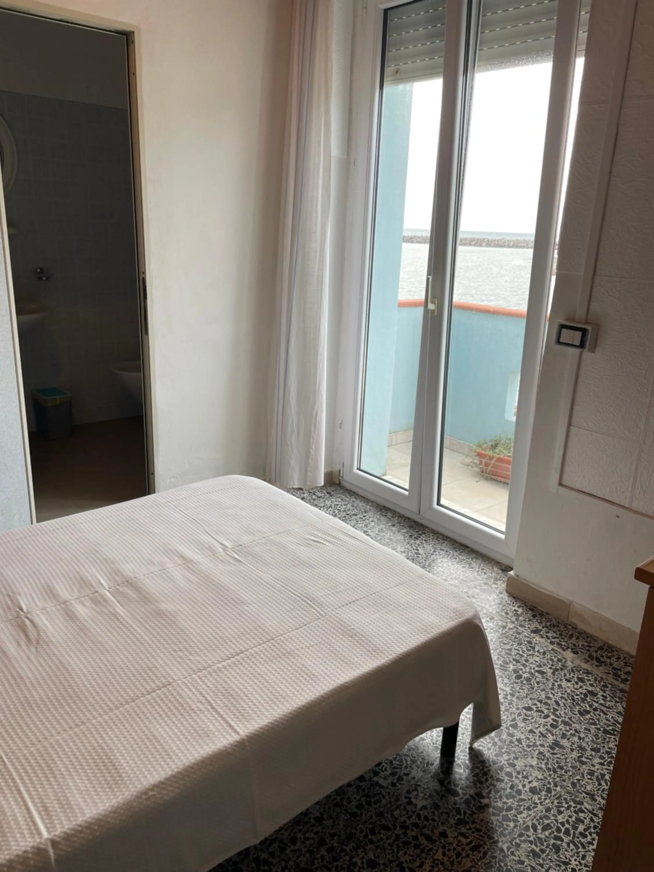 Bed in Hotel Miramare