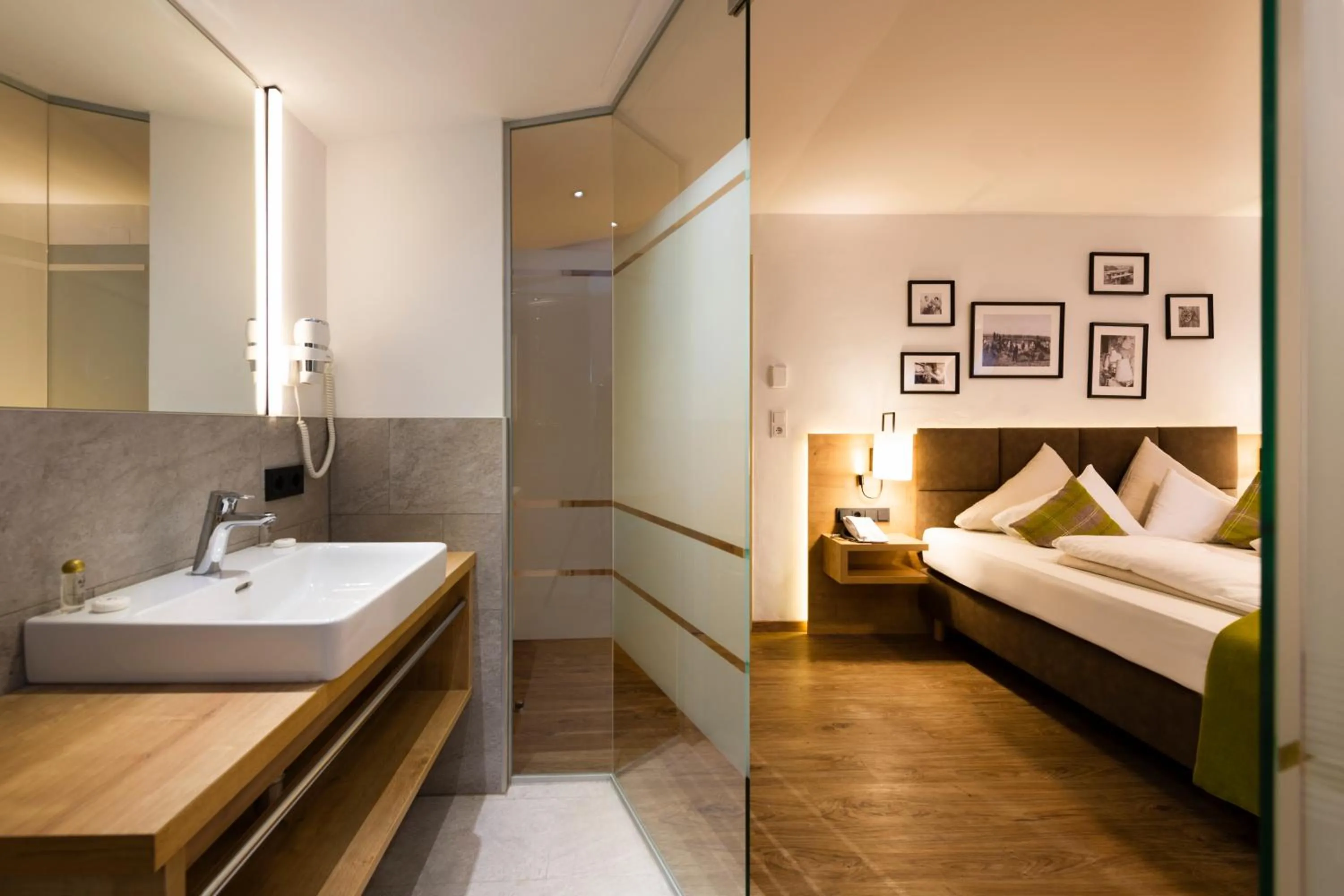 Bathroom, Bed in Hotel Brugger
