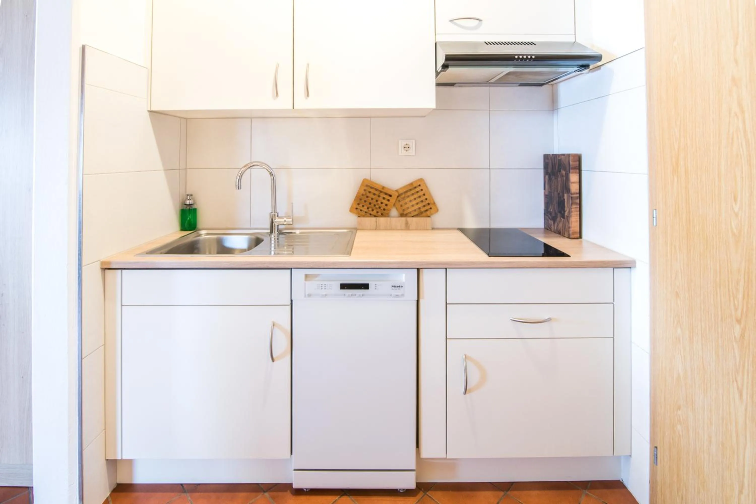 Kitchen or kitchenette in Apartments Heidenberger Fienili