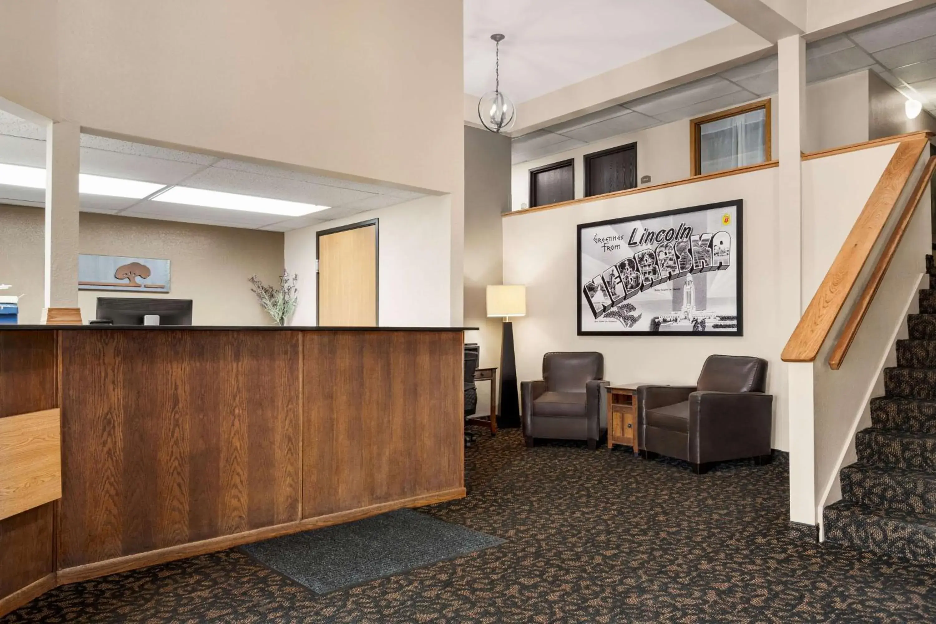 Lobby or reception in Super 8 by Wyndham Lincoln North Lobby or reception in Super 8 by Wyndham Lincoln North
