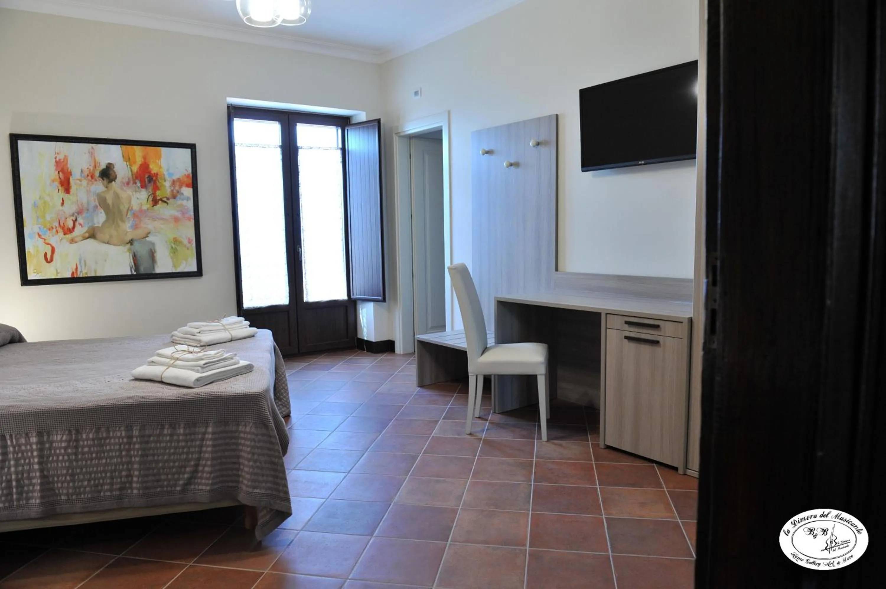 Bed in La Dimora del Musicante HomeGallery