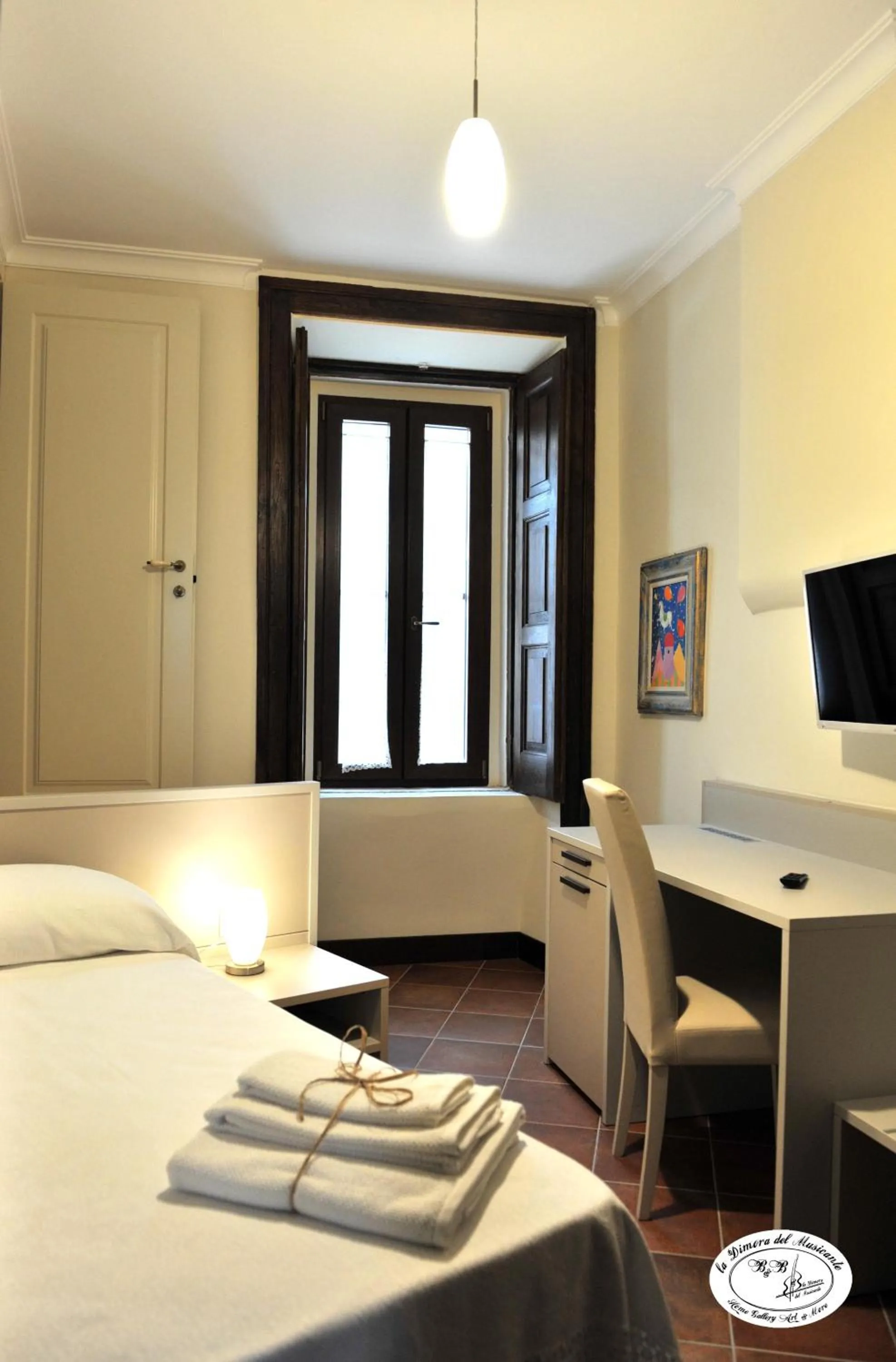 Bed in La Dimora del Musicante HomeGallery