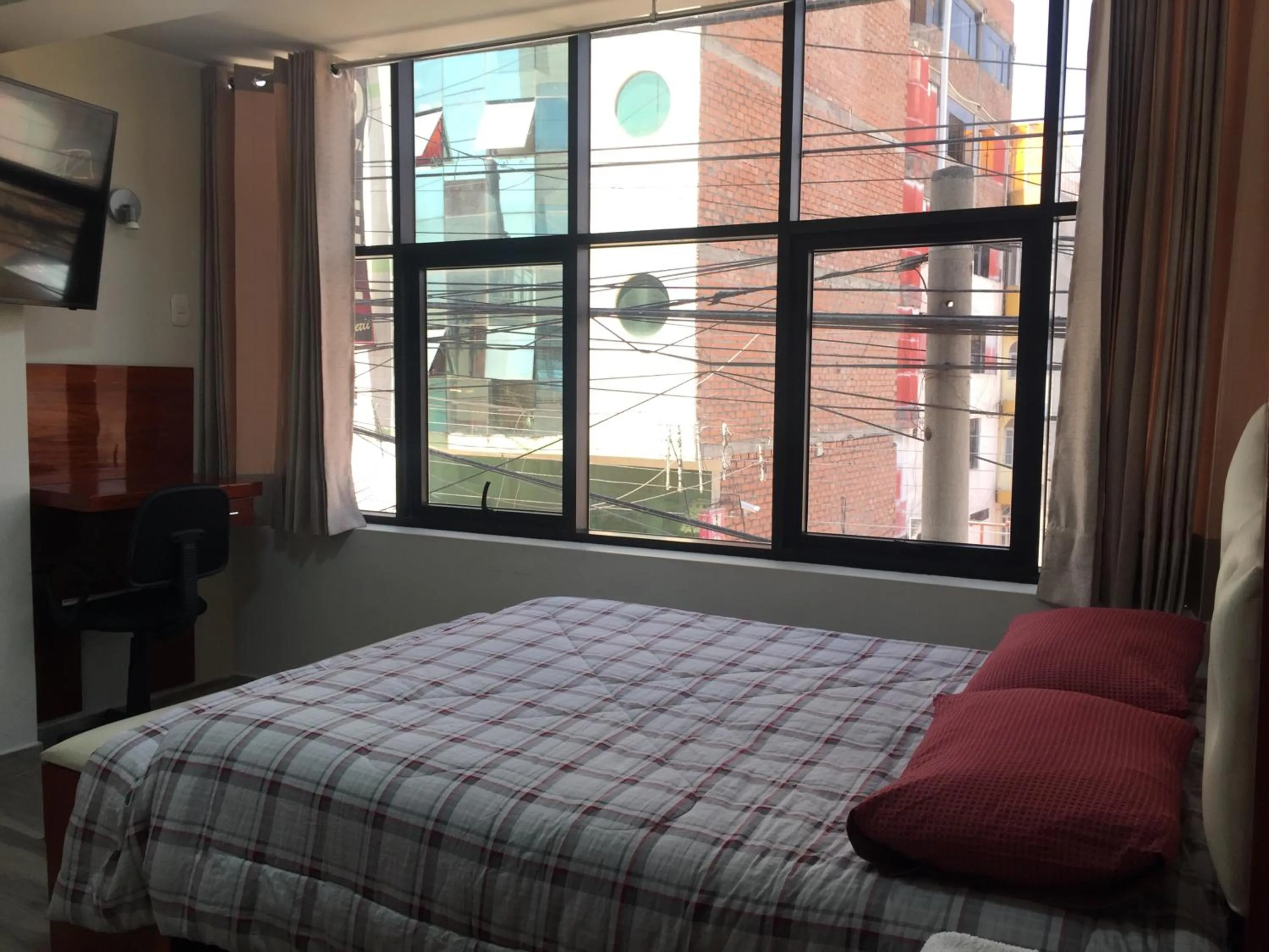 Bed in A-Hope Suite Hotel