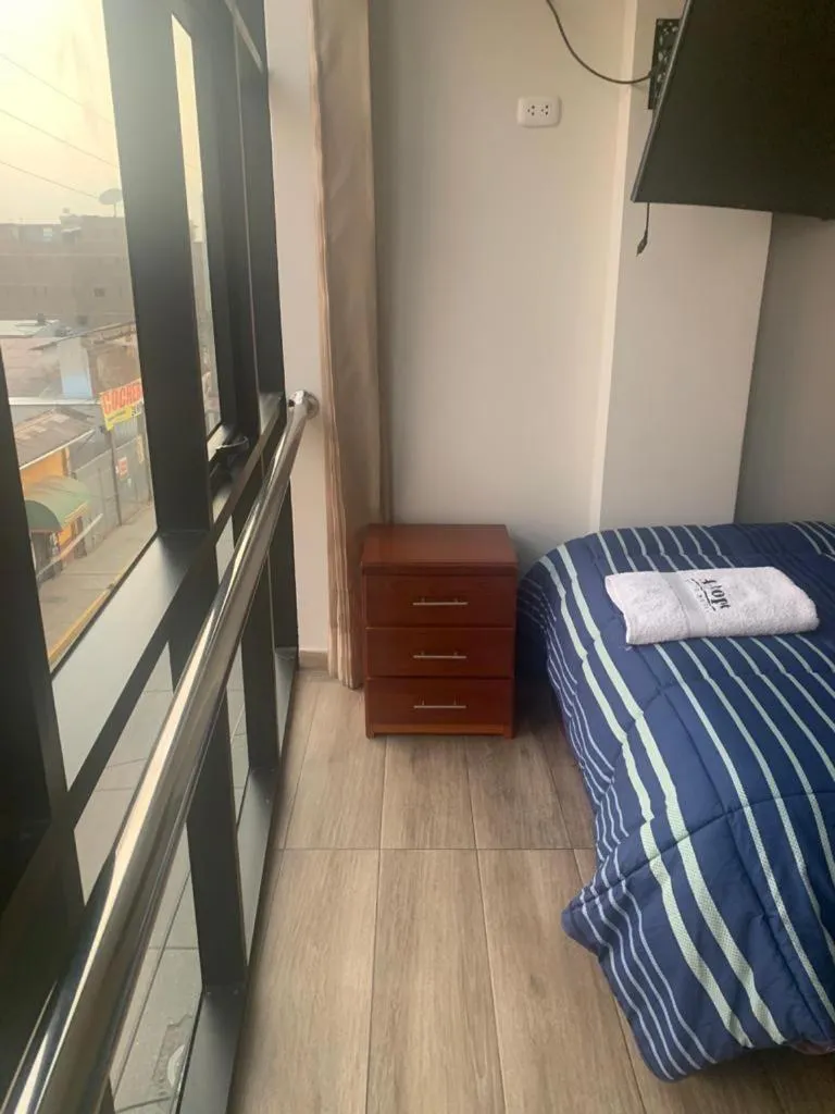 Bed in A-Hope Suite Hotel