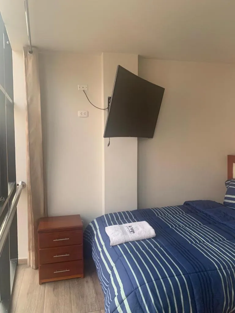 Bed in A-Hope Suite Hotel