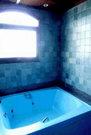 Bathroom in Estalagem Motel (Adult Only)