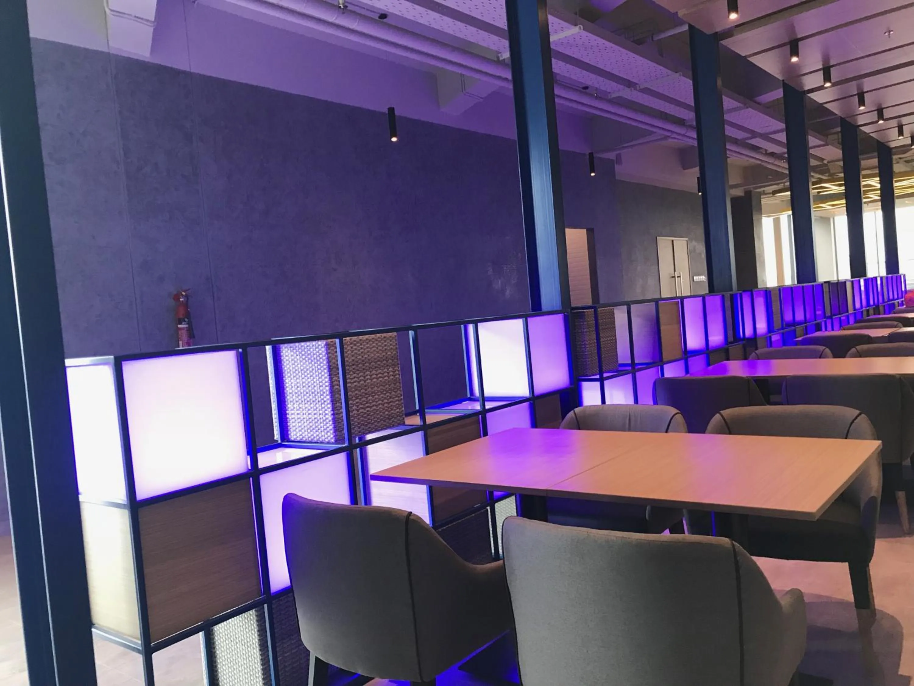 Seating area in YELLO Hotel Paskal Bandung