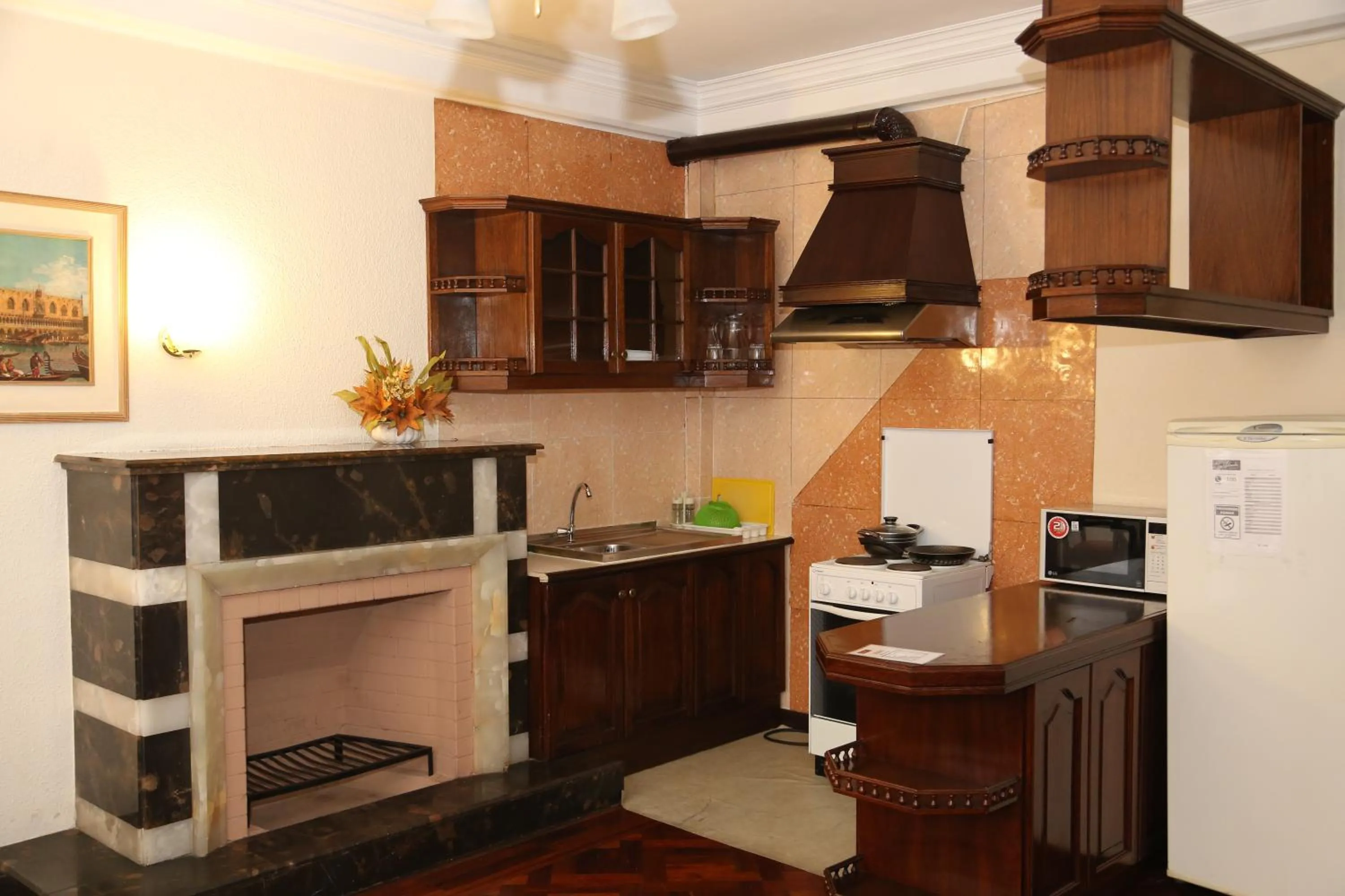 Kitchen or kitchenette in Alcalá Apart Hotel