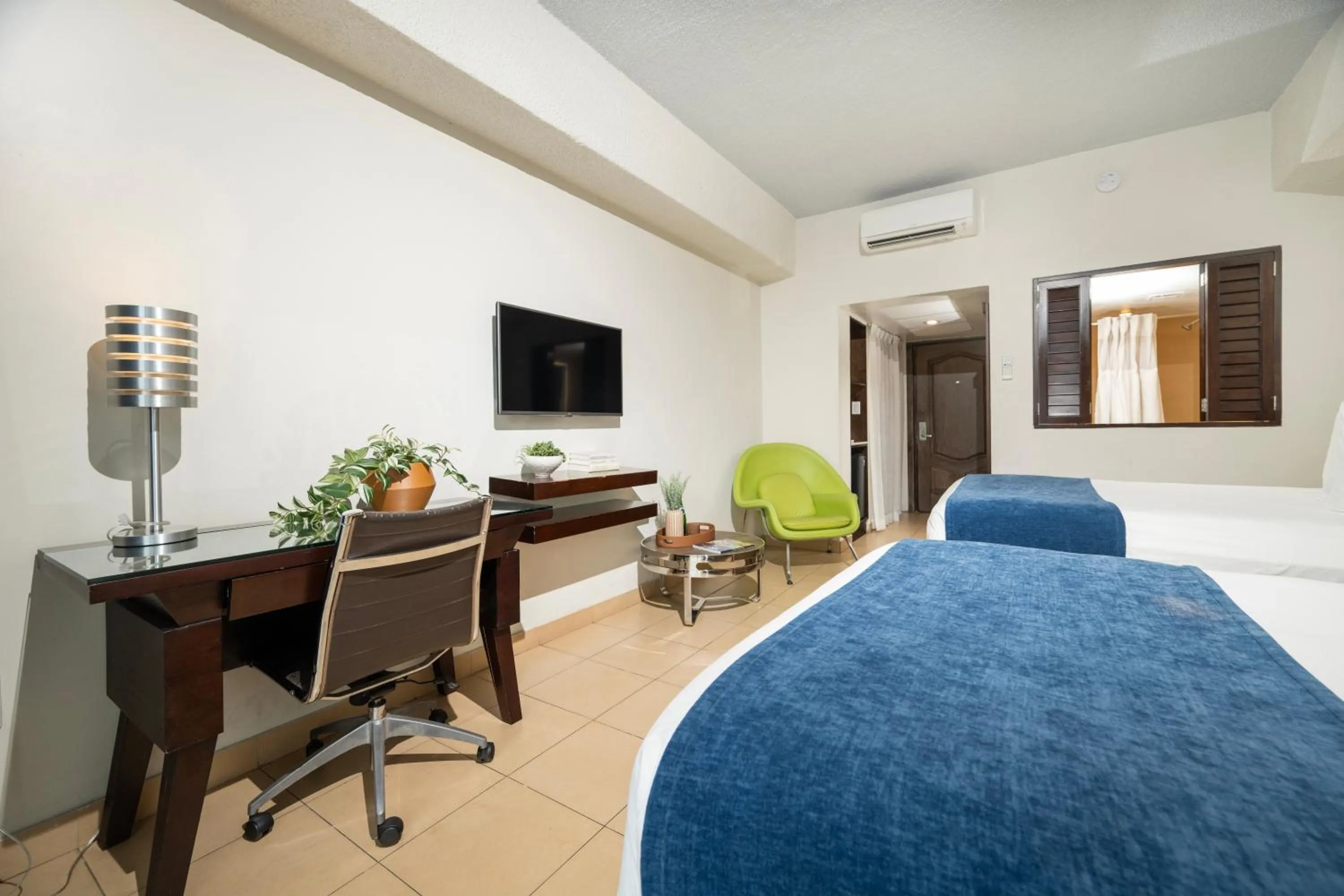 Bed in Windward Passage Hotel