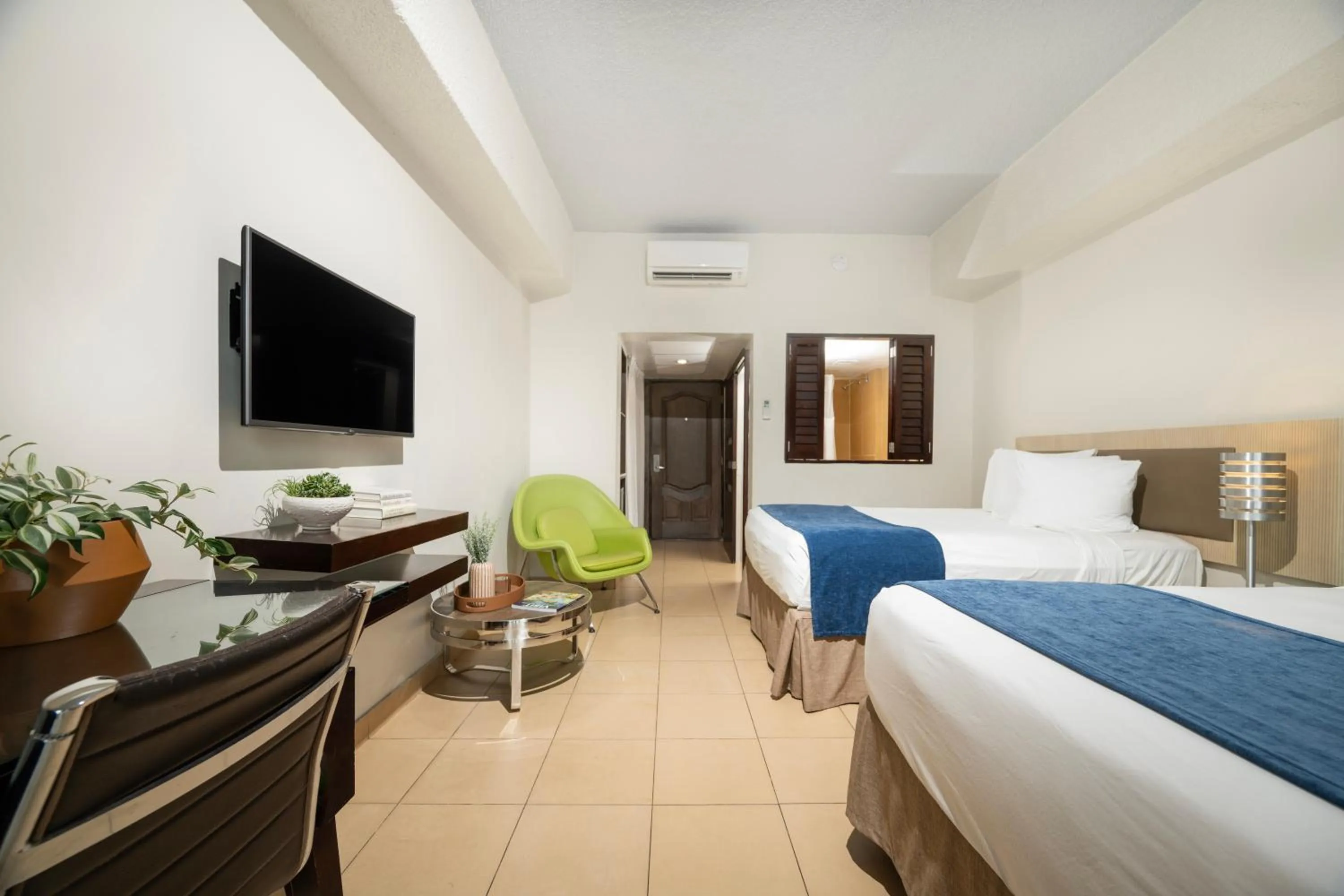 Bed in Windward Passage Hotel