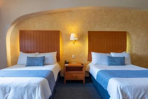 Bed in Hotel Flamingo Inn