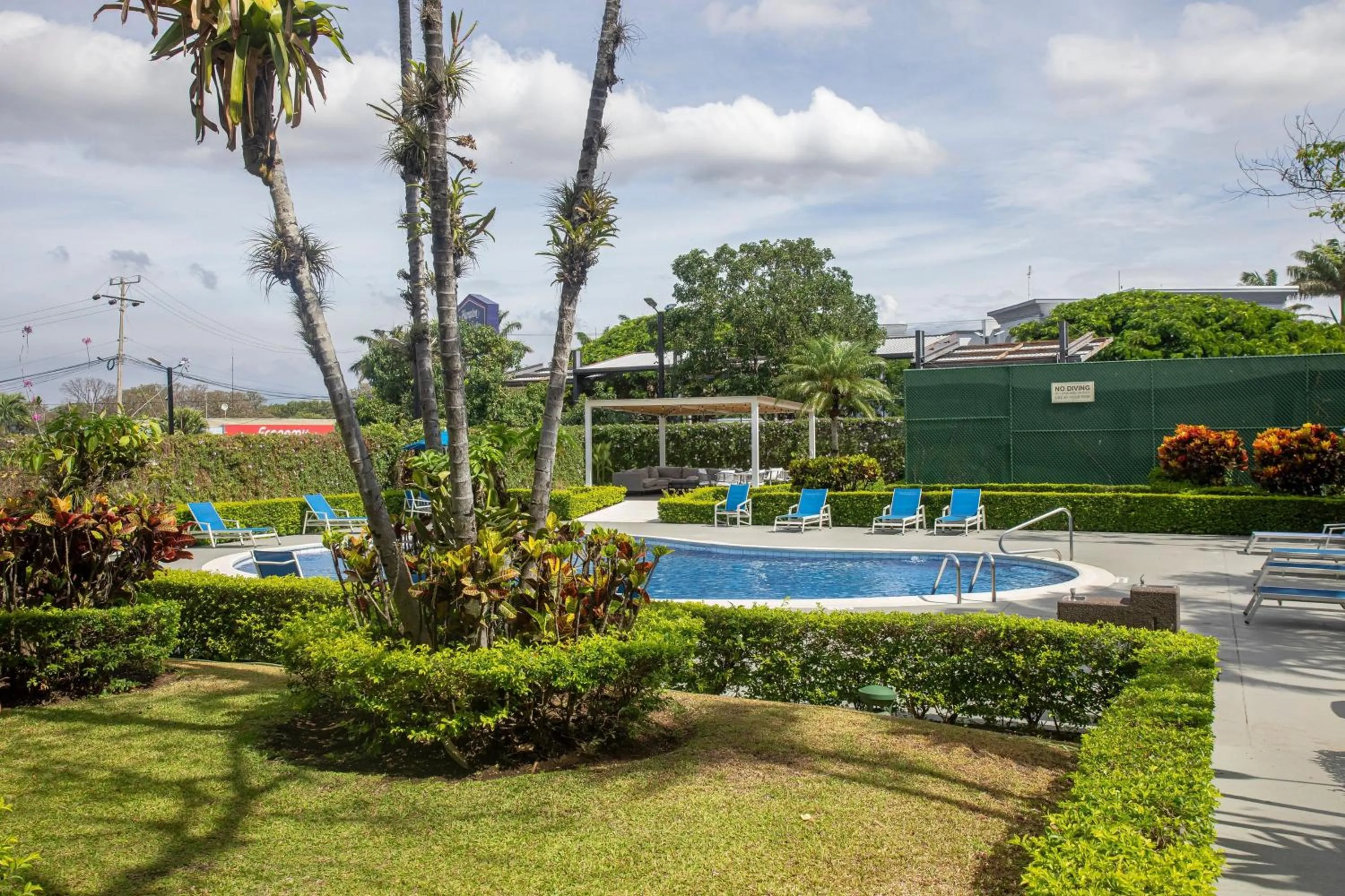 Swimming pool in Holiday Inn Express San Jose Costa Rica Airport by IHG