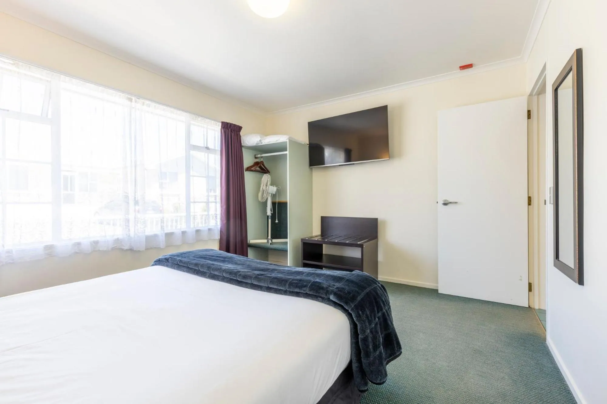 Bed in ASURE PRINCE motor lodge