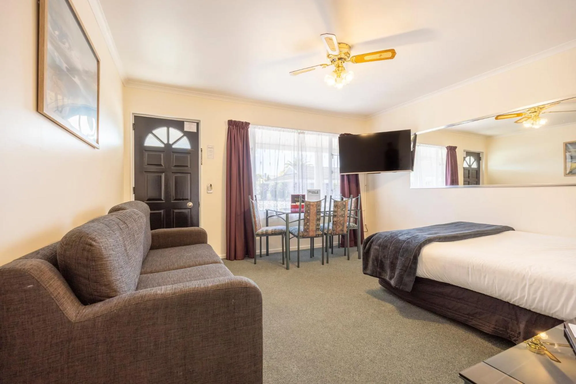 Living room, Bed in ASURE PRINCE motor lodge