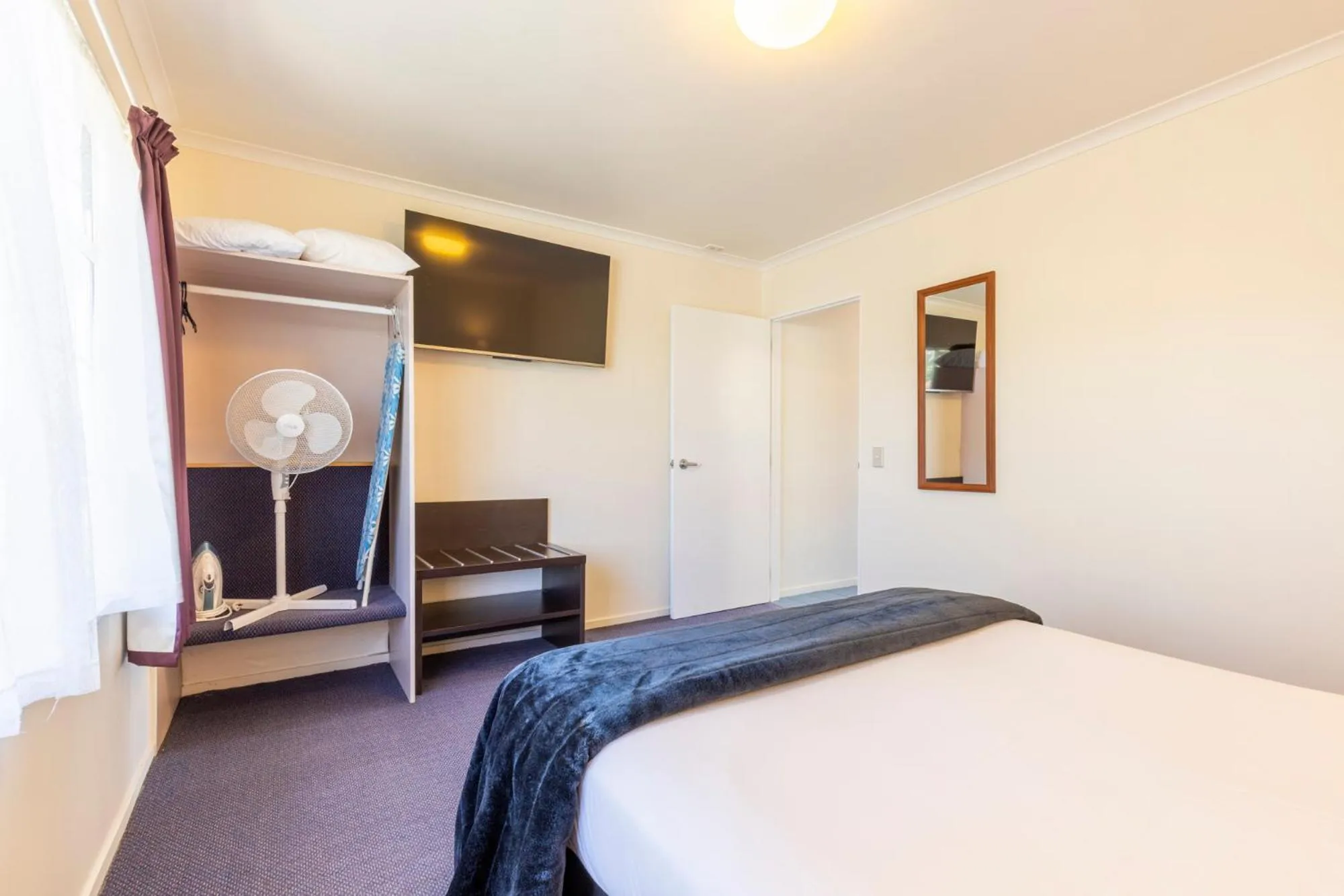 Bed in ASURE PRINCE motor lodge