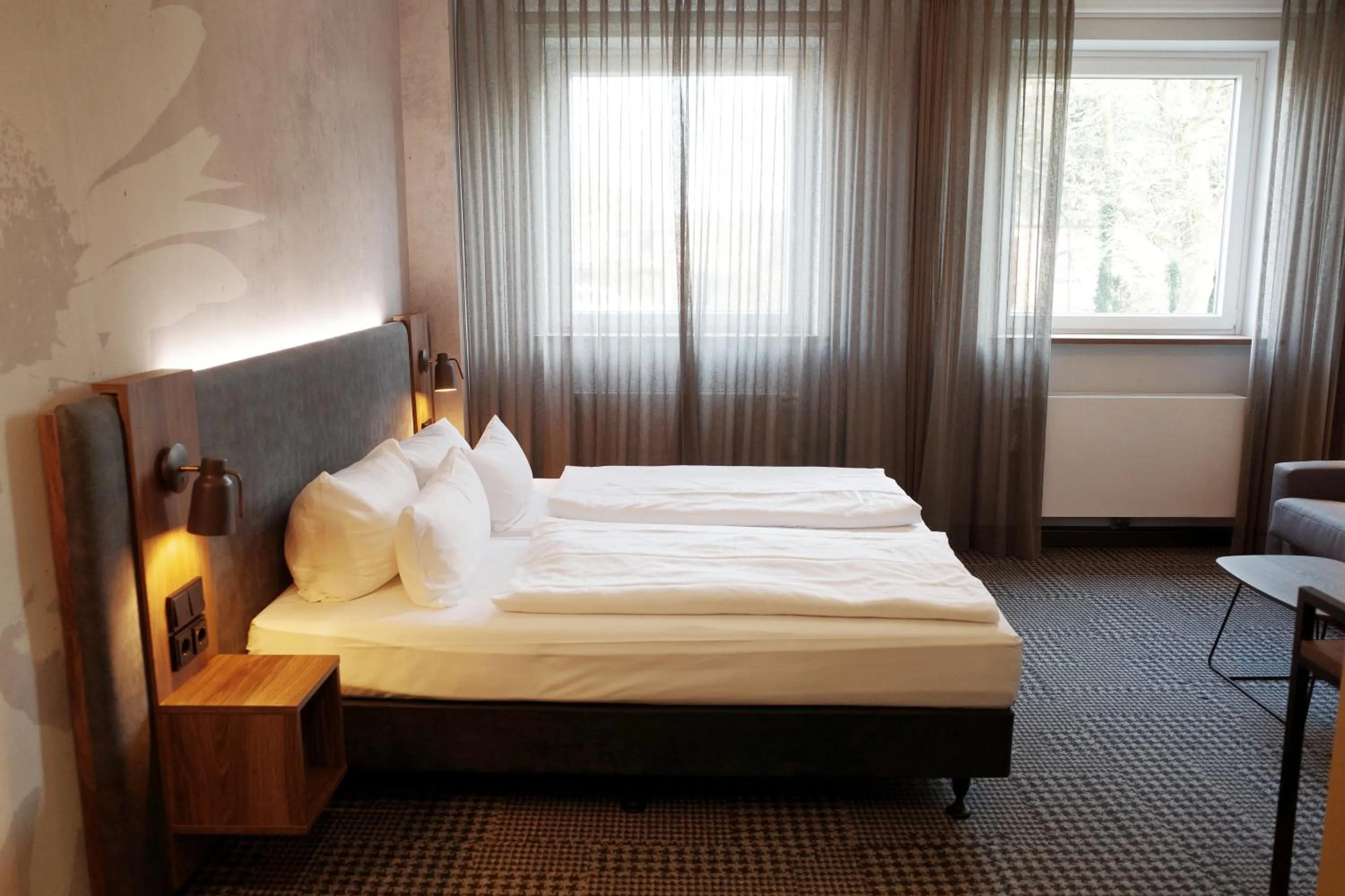 Photo of the whole room, Bed in Bundt's Hotel & Gartenrestaurant