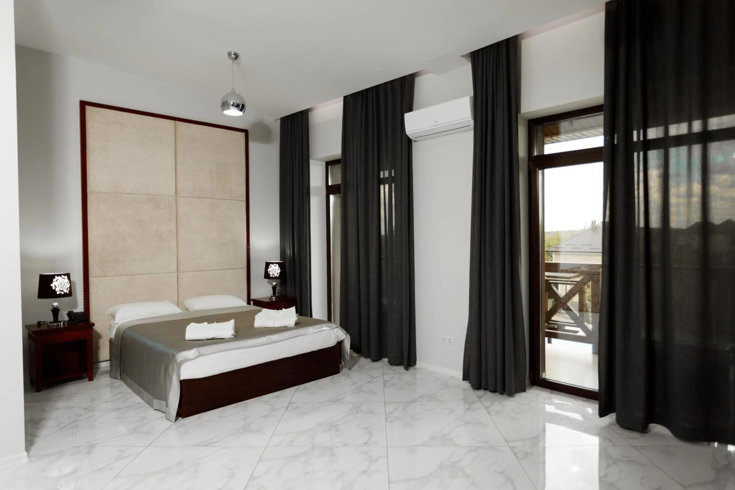 King Suite with Balcony in Giowine Hotel & Restaurant