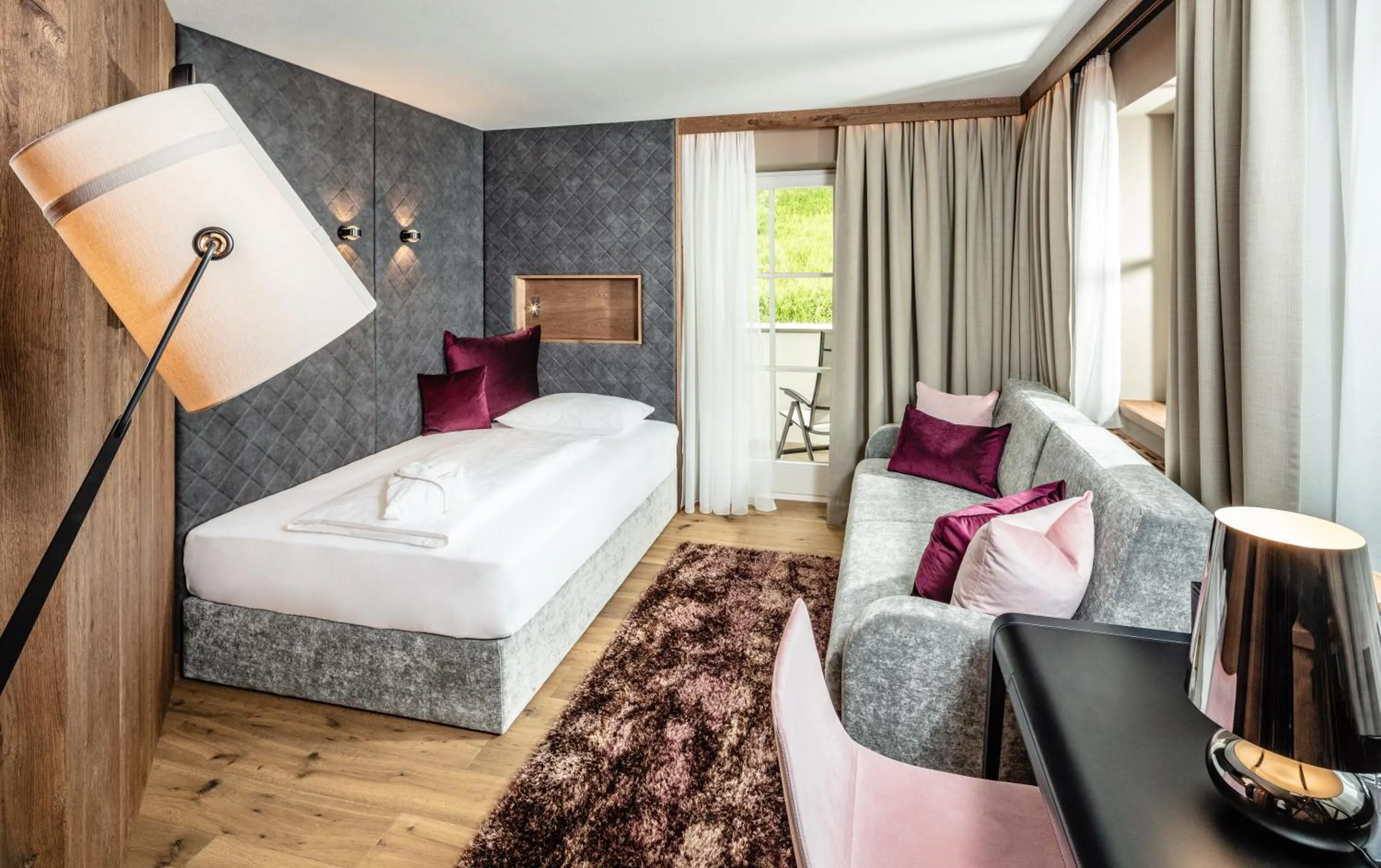 Photo of the whole room, Bed in Alpine Luxury SPA Resort Schwarzenstein